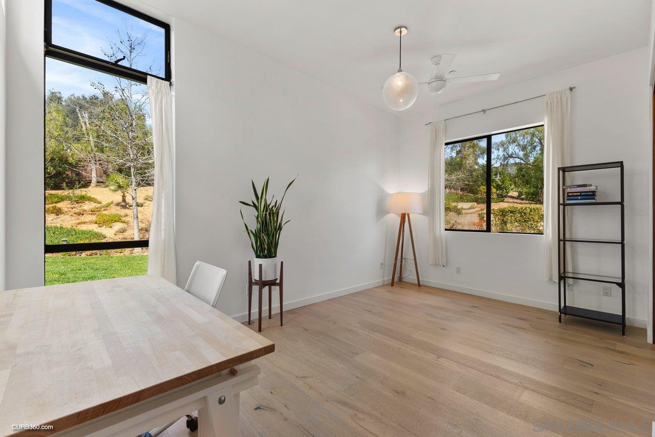 3545 Dove Hollow Road Encinitas, CA 92024 - Photo 35 of 69 a view of a room with window and wooden floor