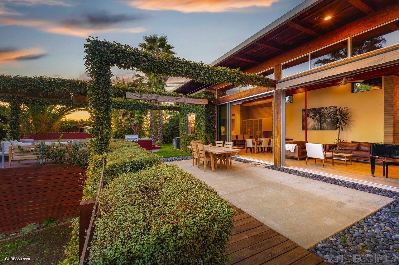 3545 Dove Hollow Road Encinitas, CA 92024 - Photo 5 of 69 a swimming pool with outdoor seating and yard