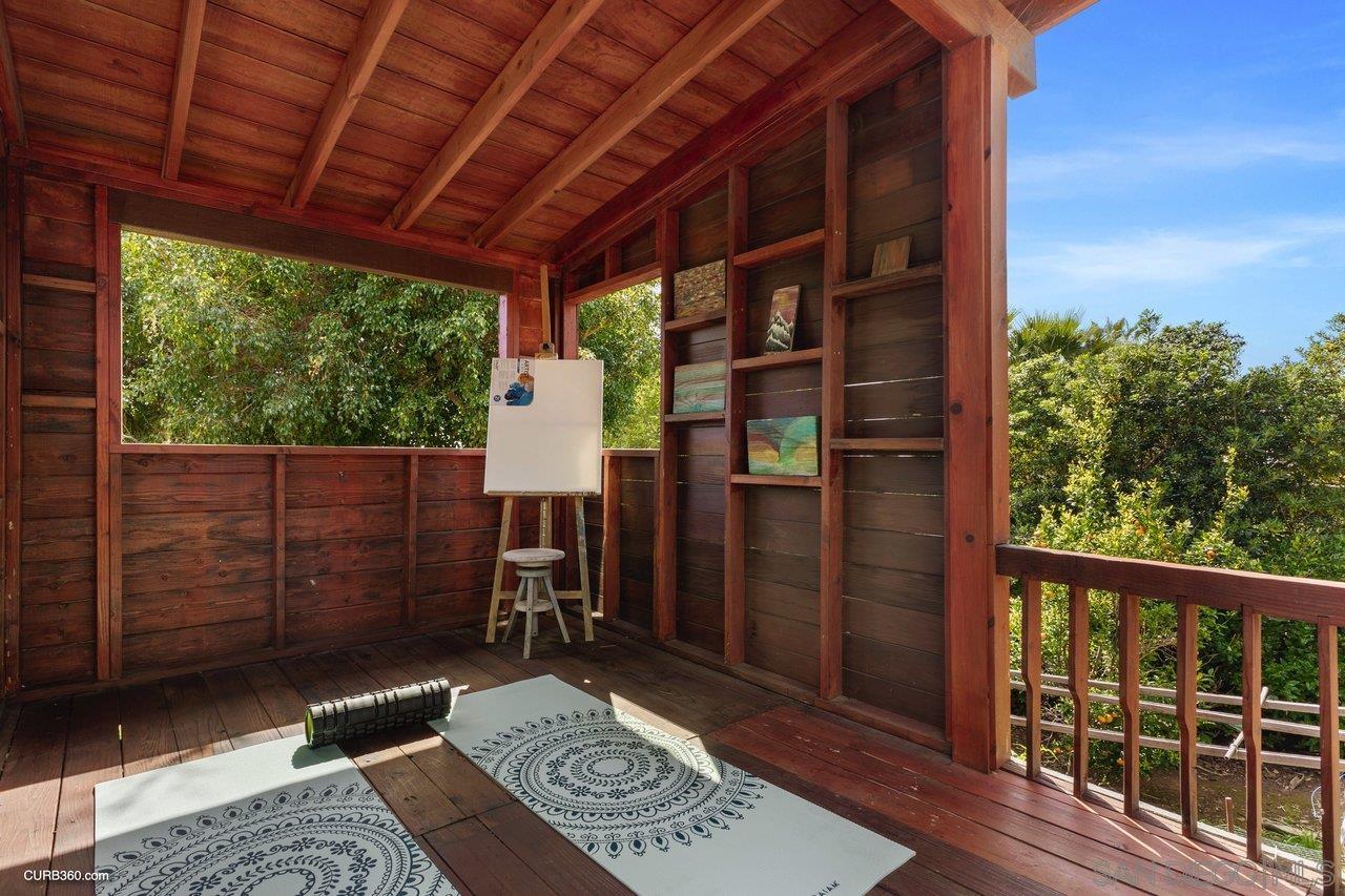 3545 Dove Hollow Road Encinitas, CA 92024 - Photo 62 of 69 a view of a porch with wooden floor and roof