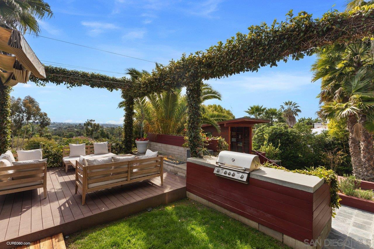3545 Dove Hollow Road Encinitas, CA 92024 - Photo 65 of 69 a view of a backyard with sitting area