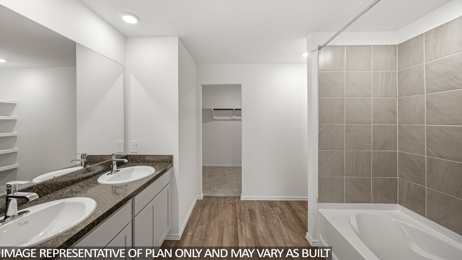 125 Rising Cedar Lane Hockley, TX 77447 - Photo 12 of 19 a bathroom with a sink and a mirror