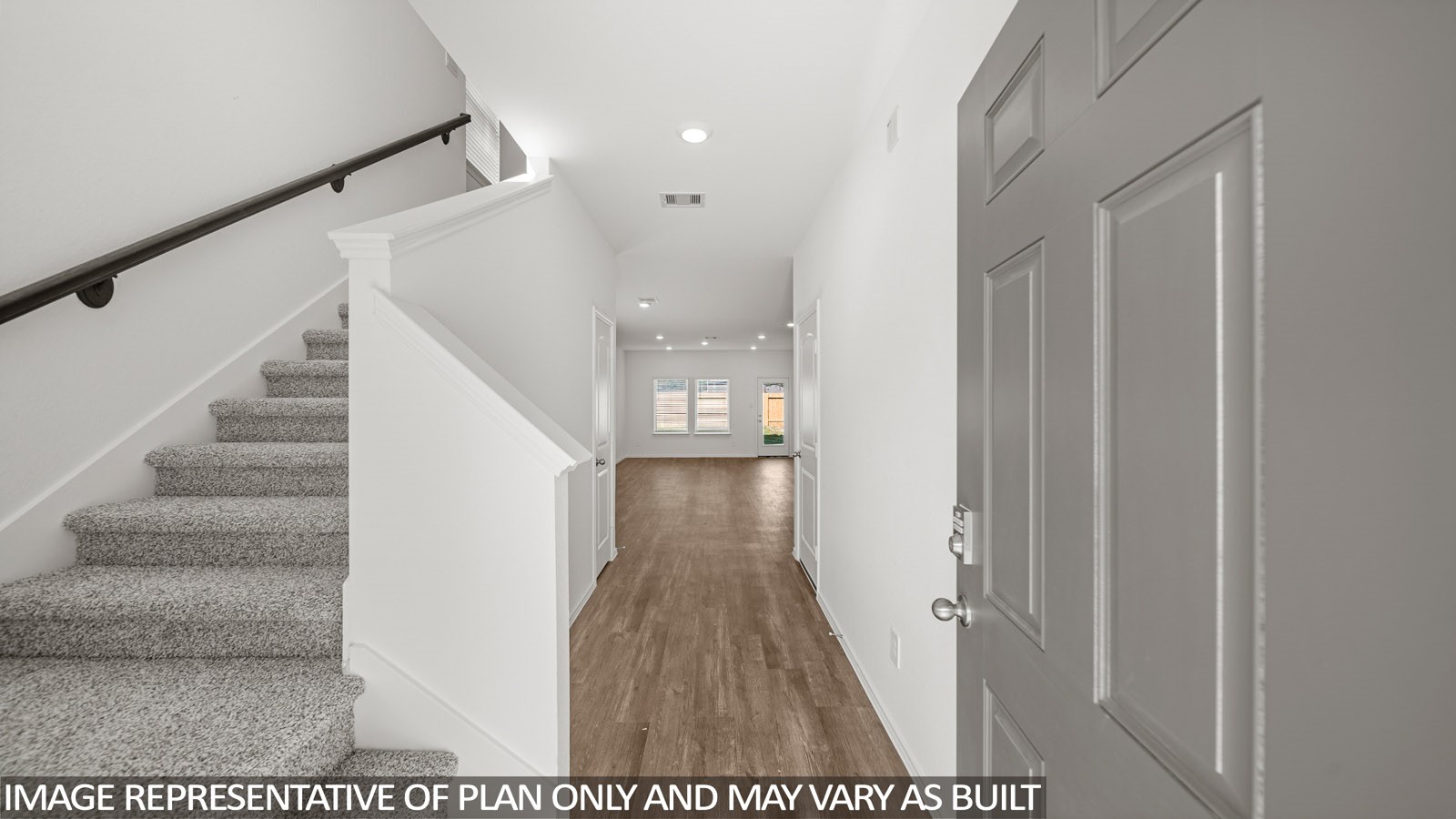 125 Rising Cedar Lane Hockley, TX 77447 - Photo 2 of 19 a view of entryway and hall with wooden floor