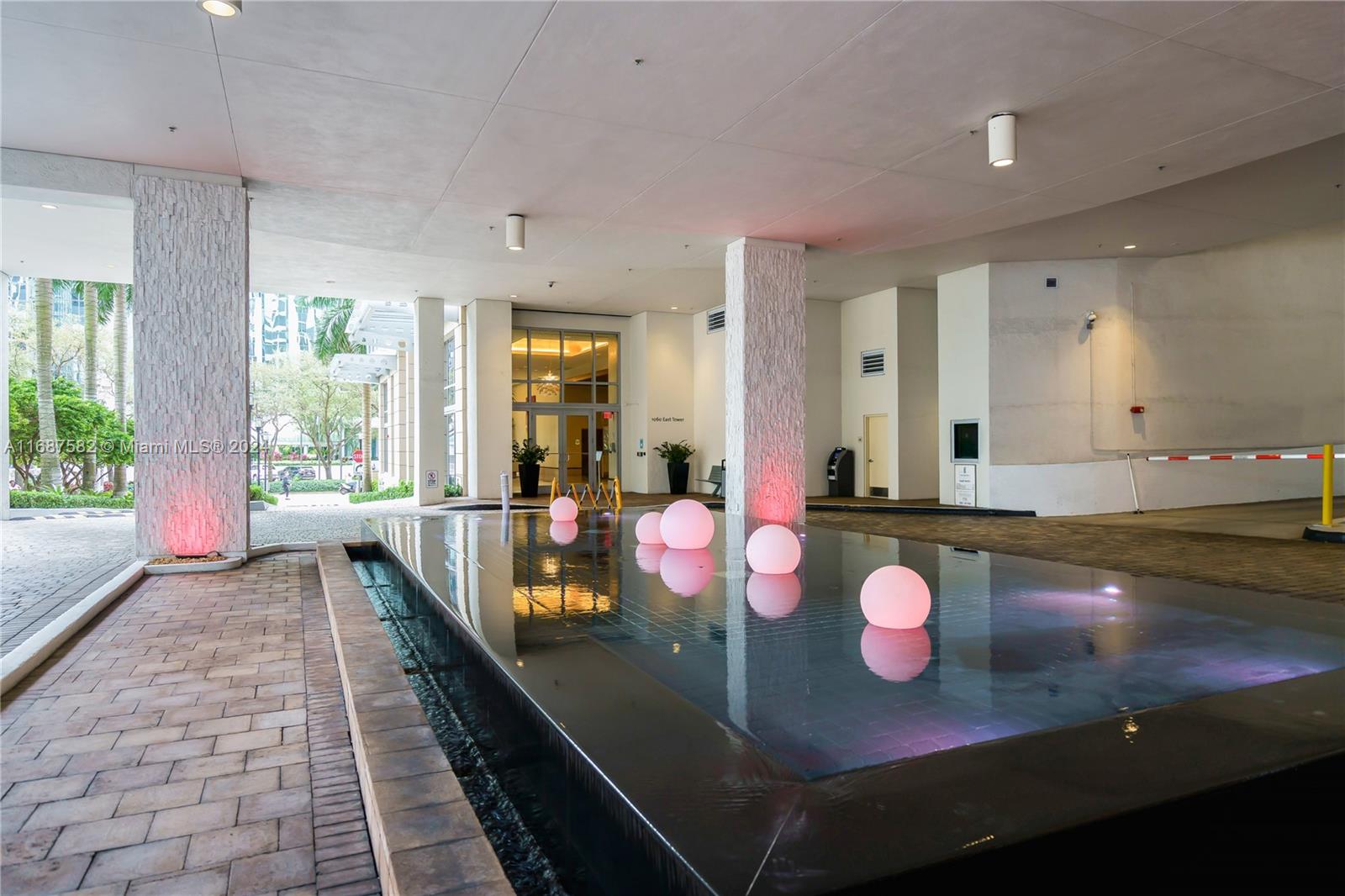 1060 Brickell Avenue, Unit 409 Miami, FL 33131 - Photo 17 of 25 a very nice looking room with a large window