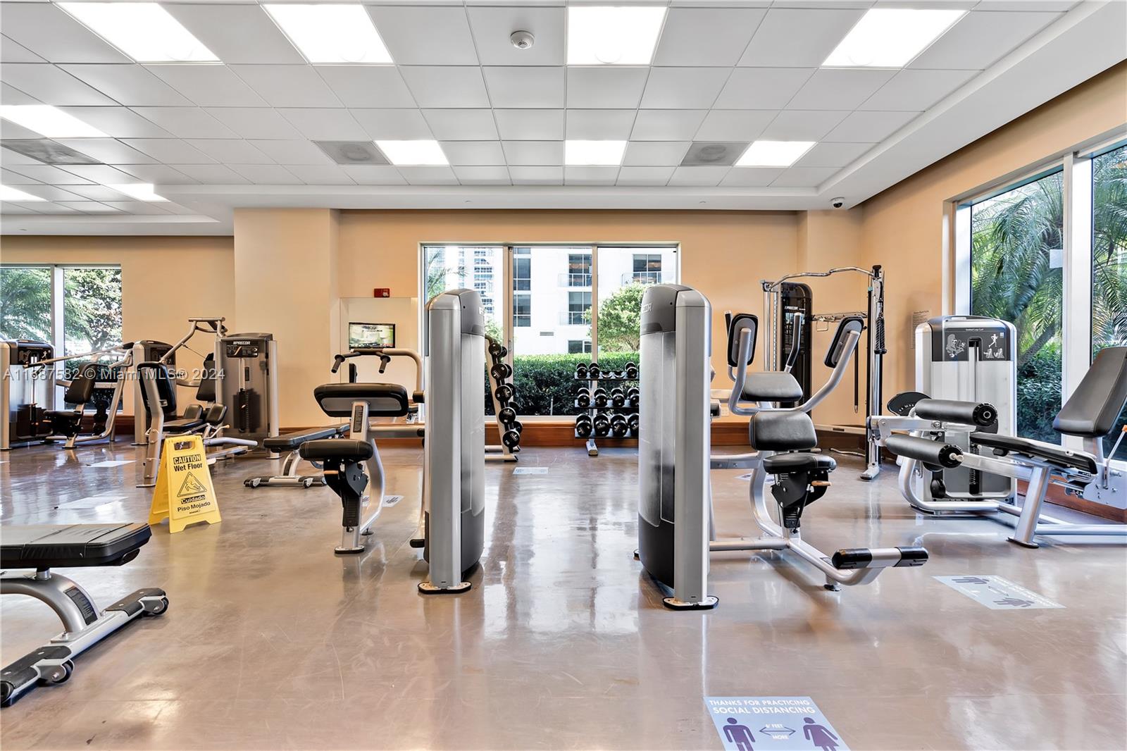 1060 Brickell Avenue, Unit 409 Miami, FL 33131 - Photo 21 of 25 a view of a room with gym equipment