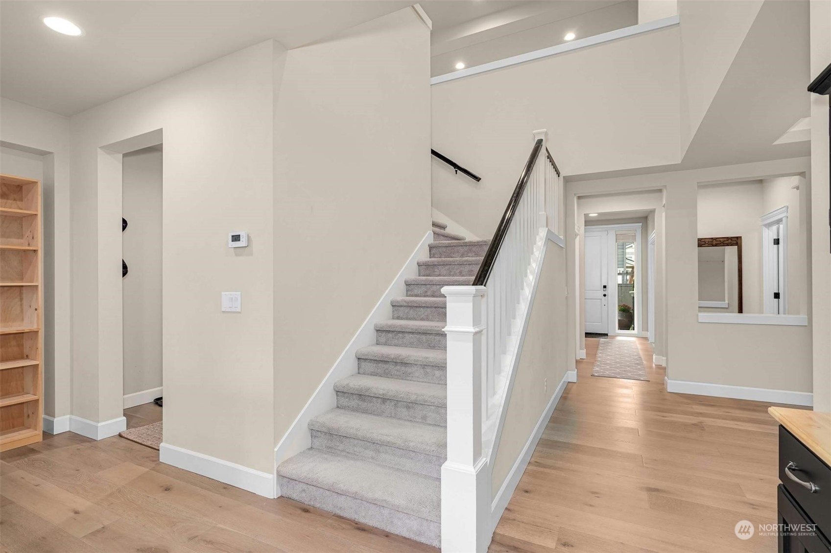 19042 84th Place Northeast Bothell, WA 98011 - Photo 20 of 40 a view of a hallway with wooden floor and entryway