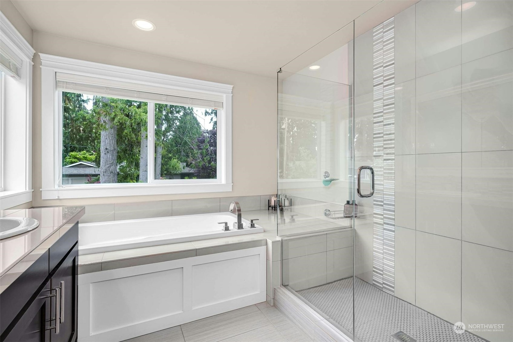 19042 84th Place Northeast Bothell, WA 98011 - Photo 23 of 40 a bathroom with a sink and a bathtub