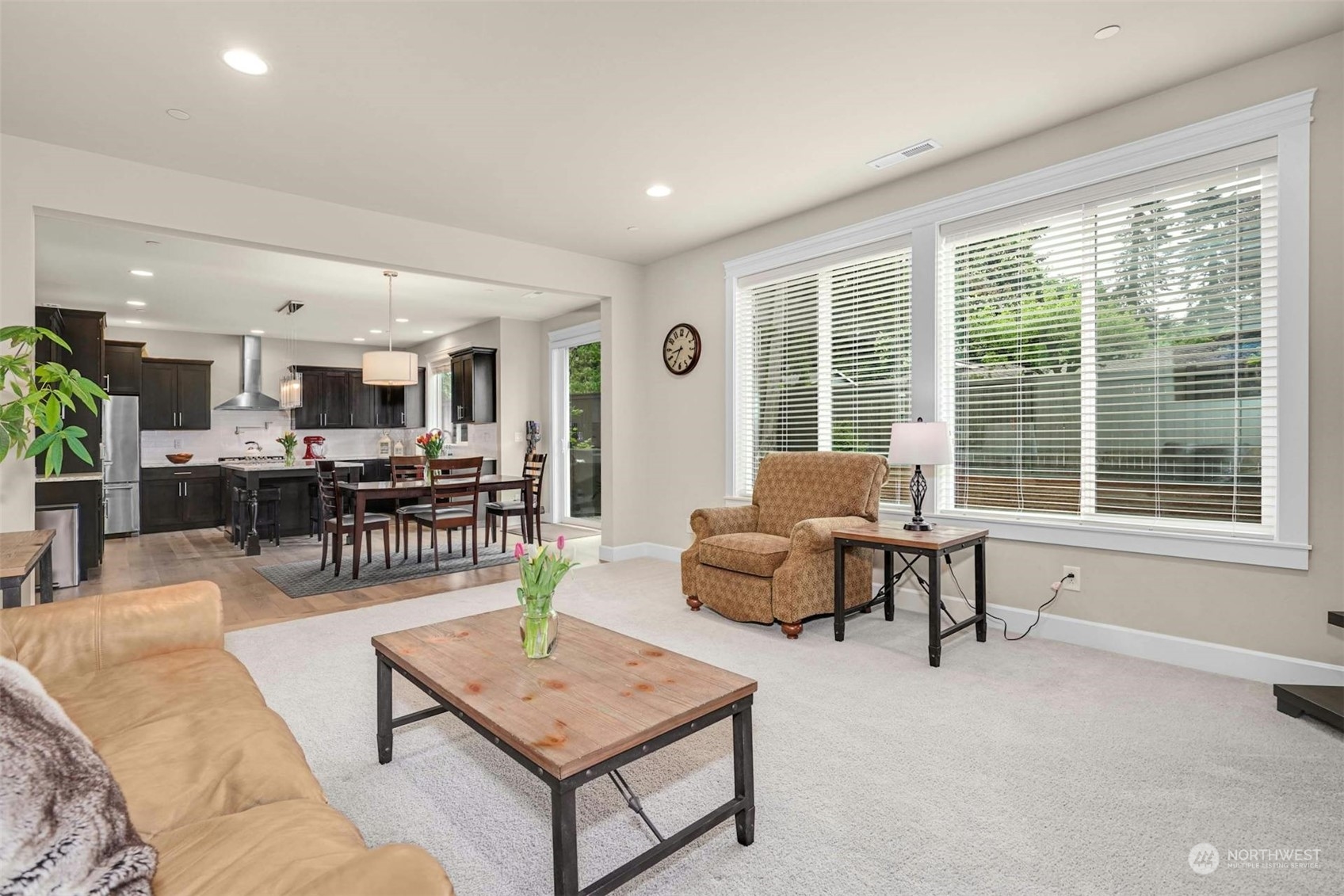 19042 84th Place Northeast Bothell, WA 98011 - Photo 8 of 40 a living room with furniture and a table