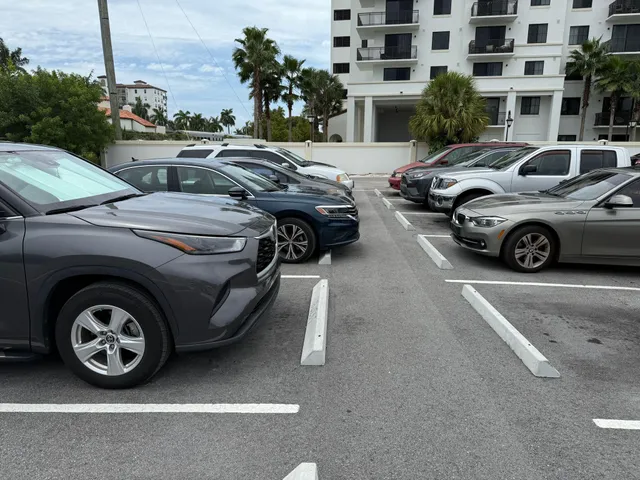 a view of a car parked in front of a building