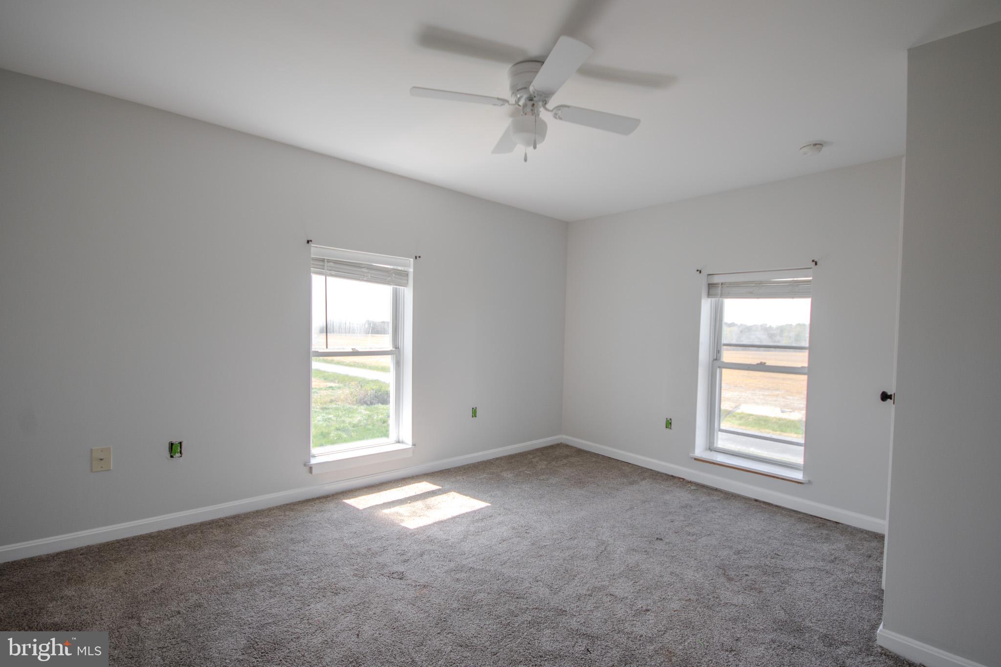 5693 Landon Store Road Marion Station, MD 21838 - Photo 13 of 20 a view of empty room with a window