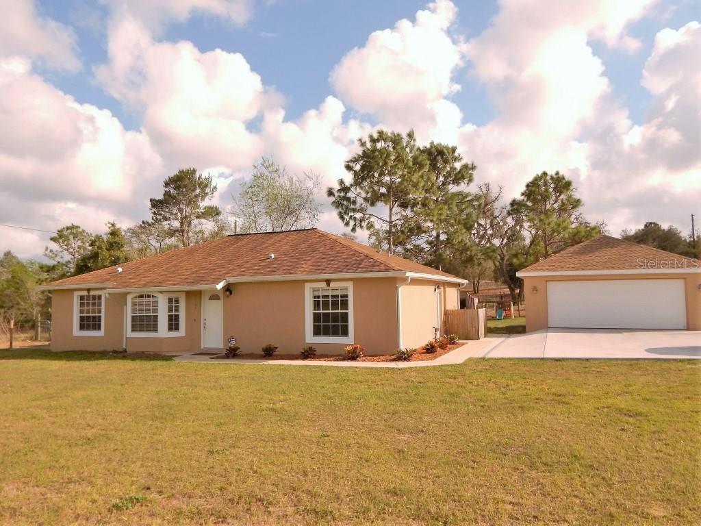 13104 Star Road Brooksville, FL 34613 - Photo 1 of 1 FRONT & Newer Garage