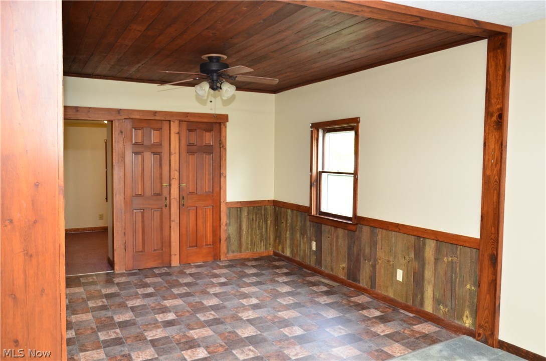 4881 Waterloo Road Atwater, OH 44201 - Photo 5 of 20 You will enjoy the warmth and charm of the pine wood ceiling and wainscoting.