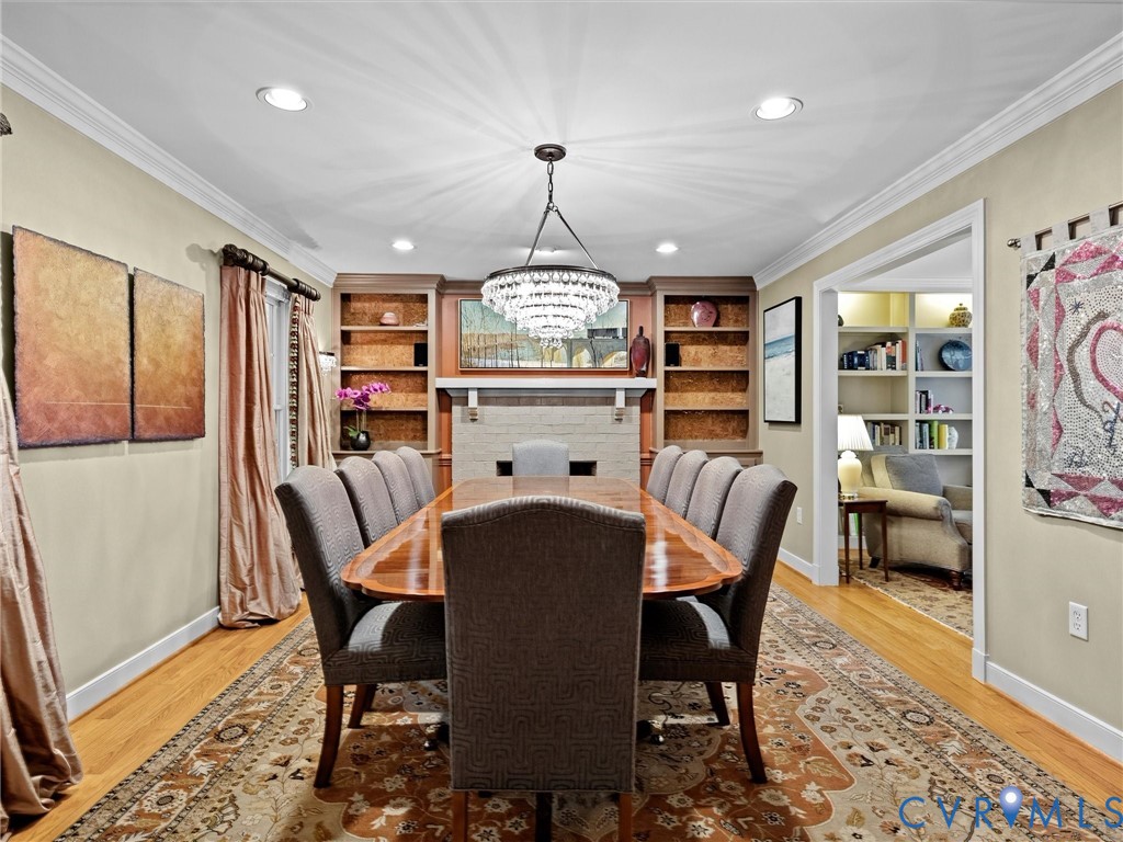 4428 Shirley Road Richmond, VA 23225 - Photo 20 of 70 Chandelier and wired sconces convey.
