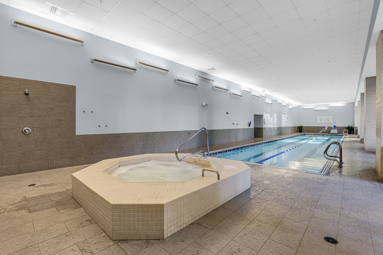 225 North Columbus Drive, Unit 5311 Chicago, IL 60601 - Photo 24 of 36 a bathroom with a tub sink and mirror