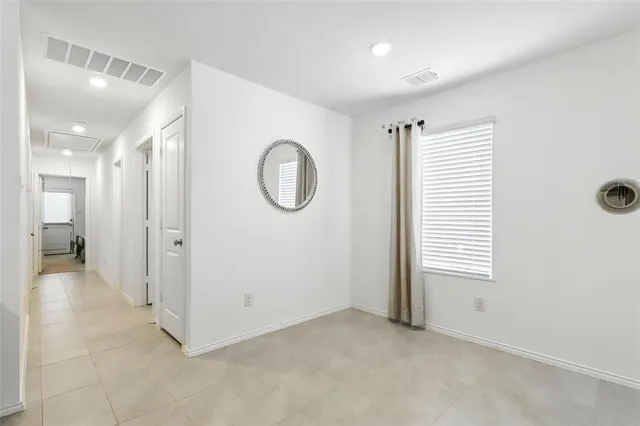 a kitchen with stainless steel appliances granite countertop a refrigerator a sink a stove a microwave a sink and cabinets