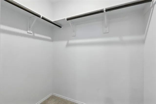 a bathroom with a shower and toilet