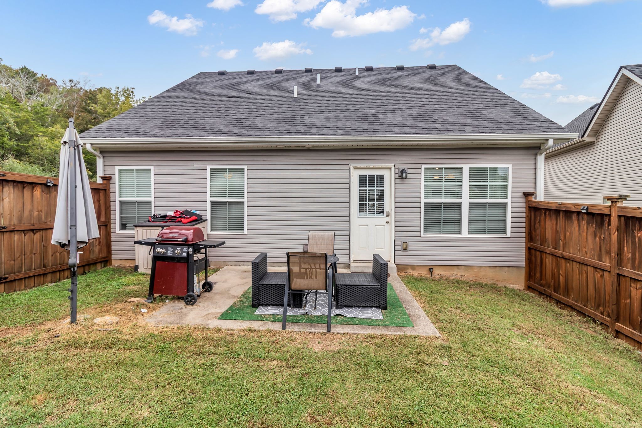 4624 Springstead Trail Antioch, TN 37013 - Photo 21 of 21 a view of house with wooden deck and furniture