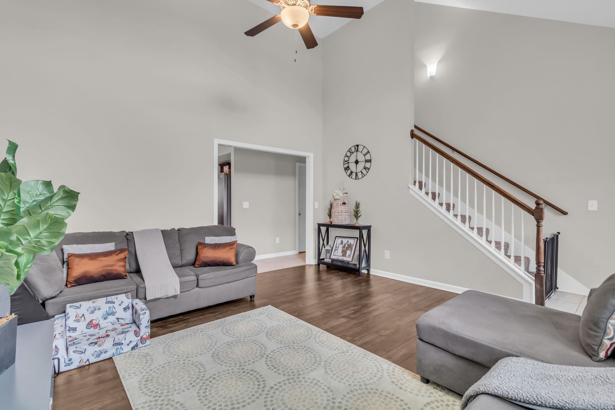 4624 Springstead Trail Antioch, TN 37013 - Photo 7 of 21 a living room with furniture and a potted plant