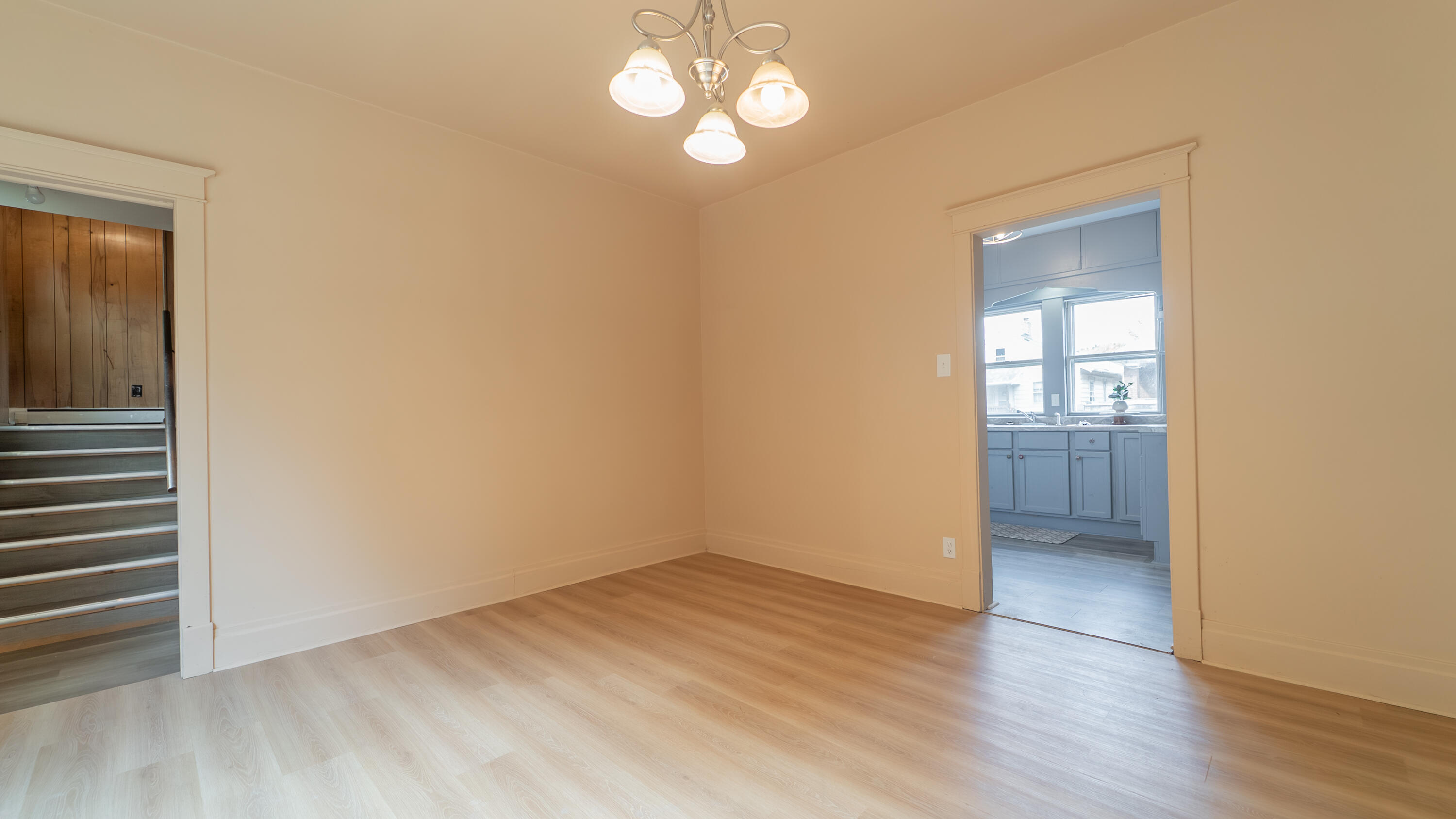 1916 Wespark Avenue Whiting, IN 46394 - Photo 11 of 32 a view of an empty room with wooden floor and a window