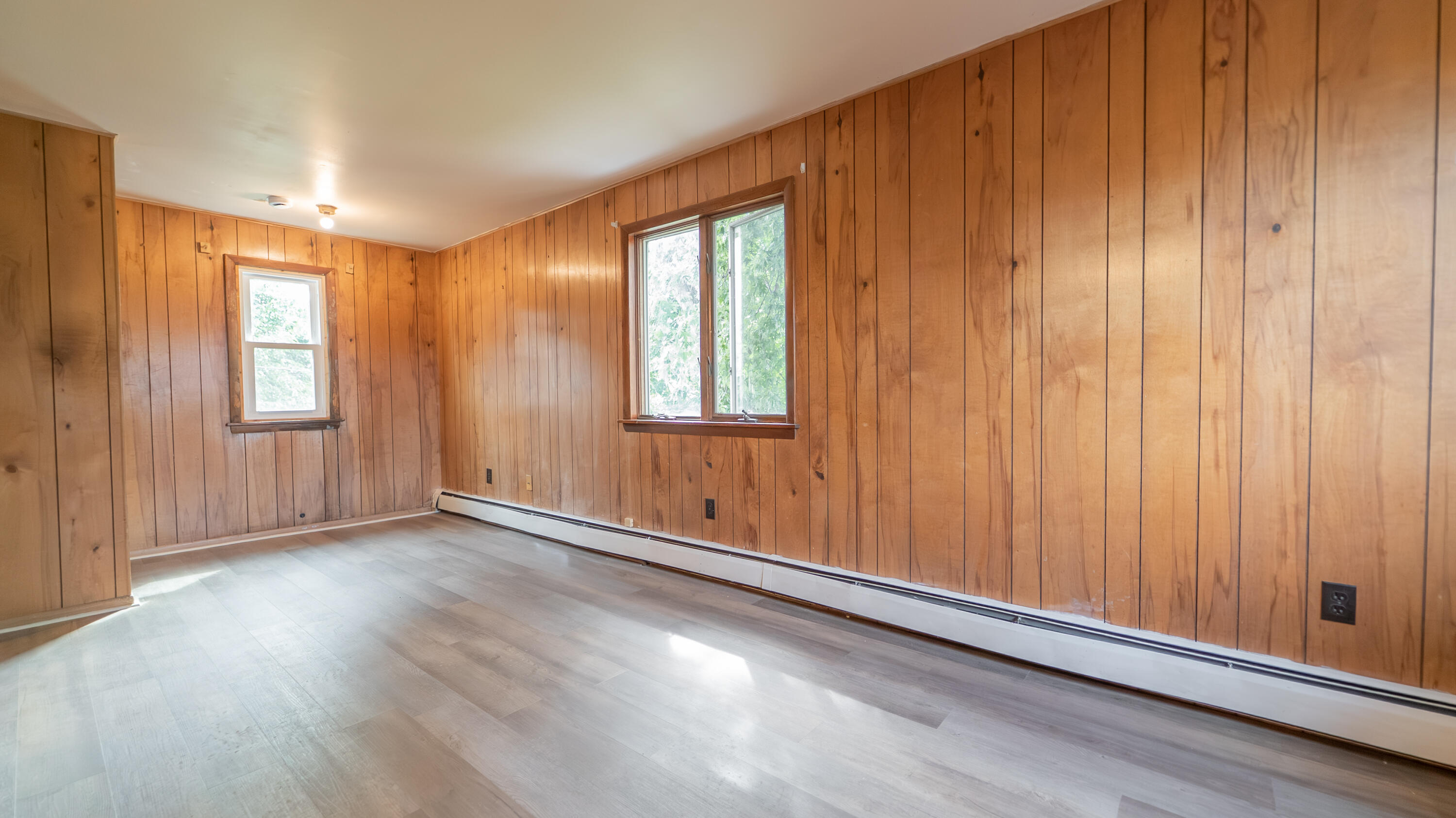 1916 Wespark Avenue Whiting, IN 46394 - Photo 17 of 32 an empty room with wooden floor and windows