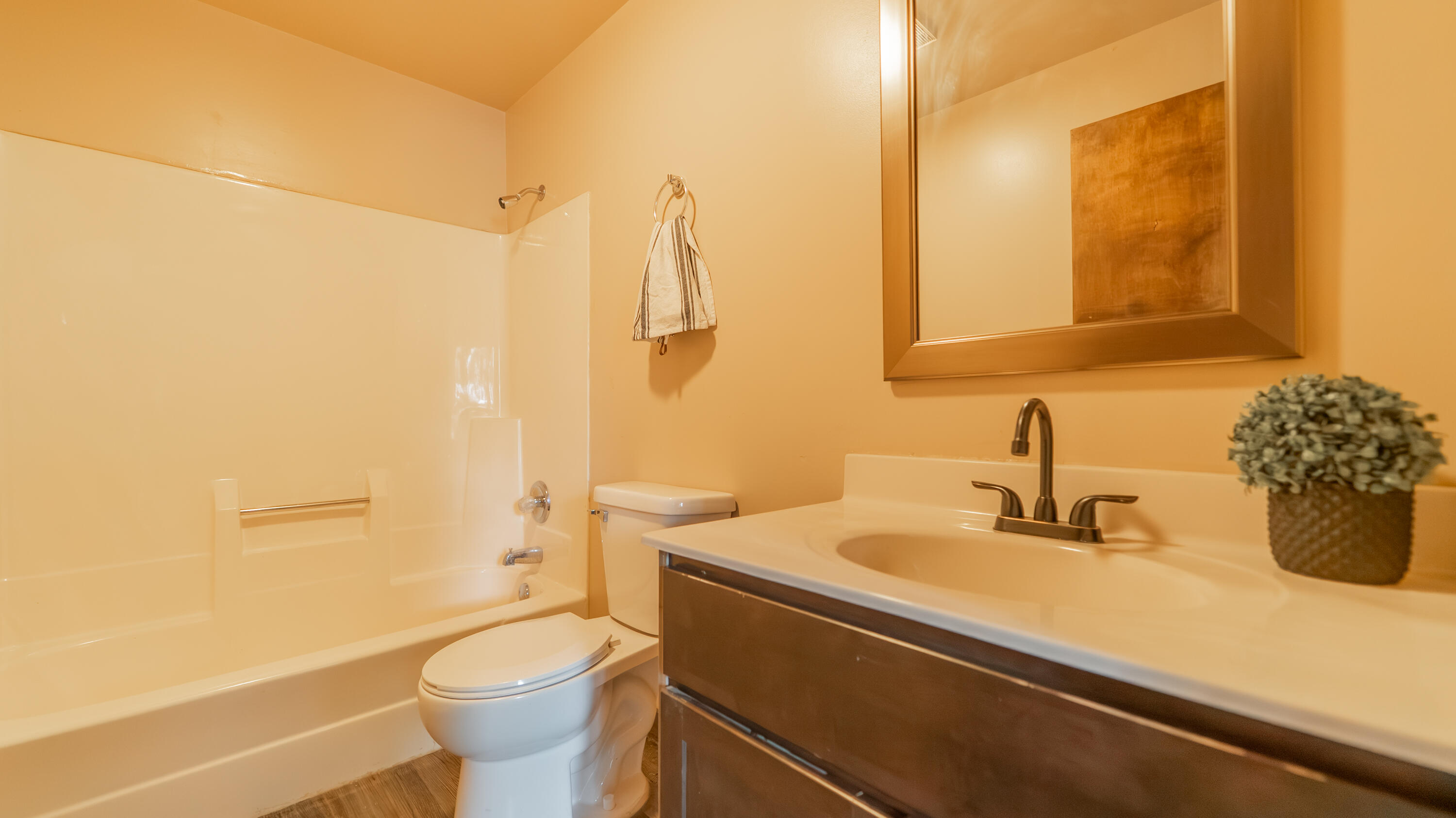 1916 Wespark Avenue Whiting, IN 46394 - Photo 20 of 32 a bathroom with a sink a toilet and shower