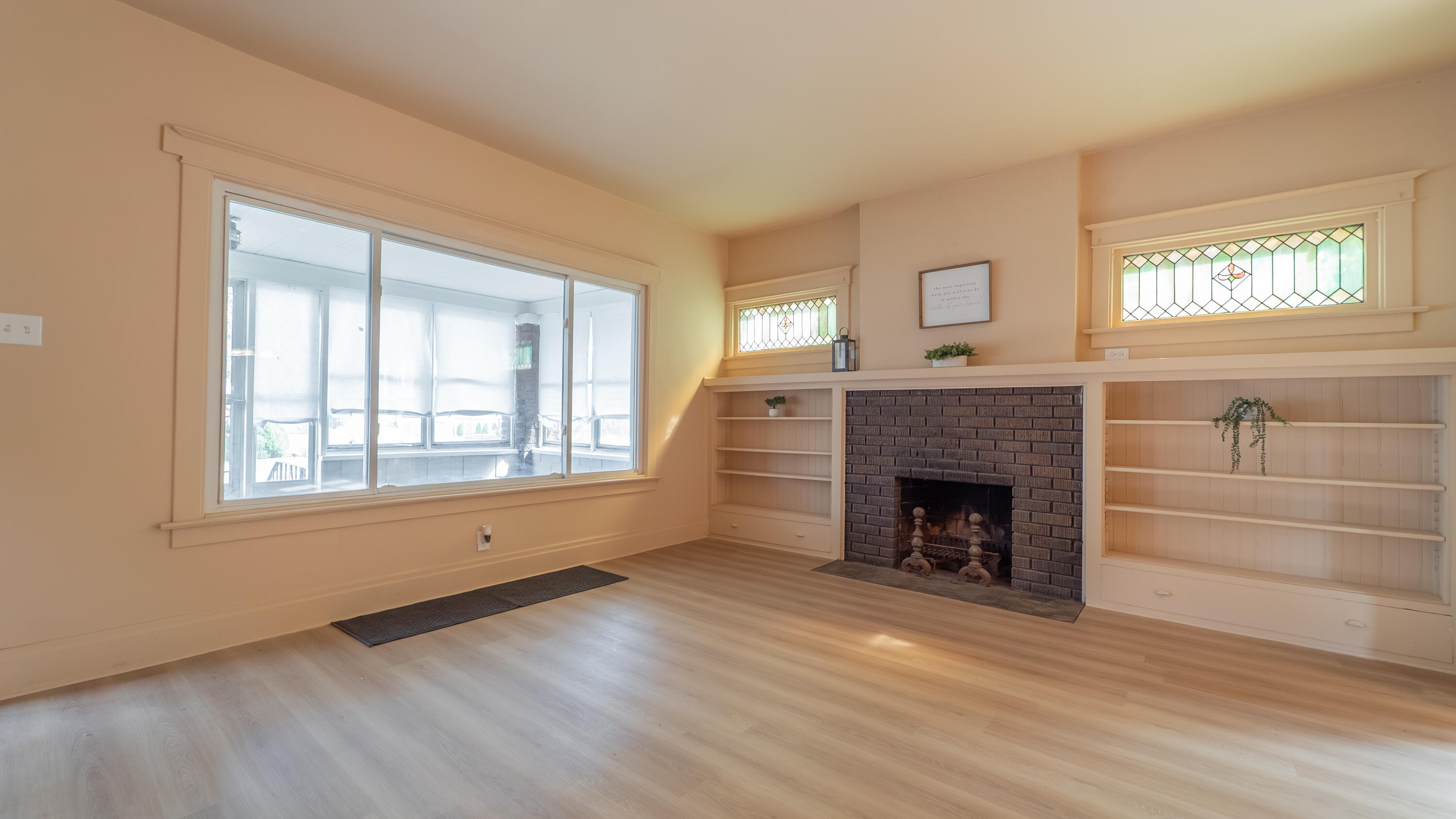 1916 Wespark Avenue Whiting, IN 46394 - Photo 5 of 32 an empty room with windows and fireplace