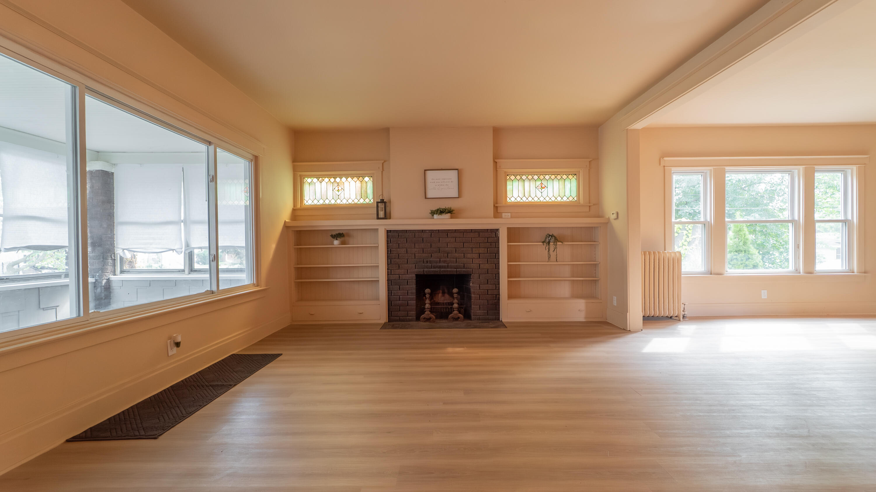 1916 Wespark Avenue Whiting, IN 46394 - Photo 6 of 32 a view of an empty room with window and fire place