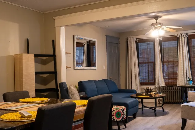 a view of a livingroom with furniture and window