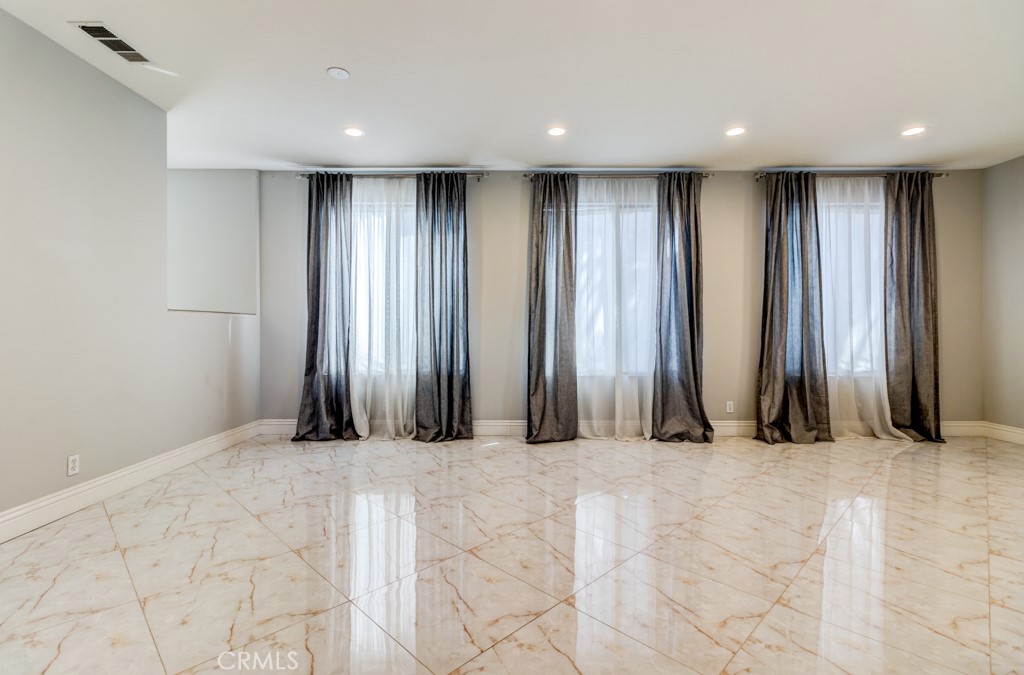 8 Zinnia Irvine, CA 92618 - Photo 19 of 39 an empty room with windows