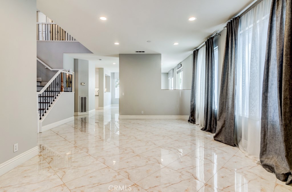 8 Zinnia Irvine, CA 92618 - Photo 20 of 39 a view of entryway with wooden floor