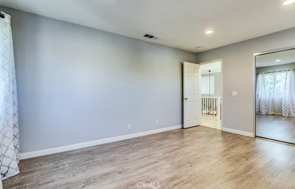 8 Zinnia Irvine, CA 92618 - Photo 27 of 39 wooden floor in an empty room