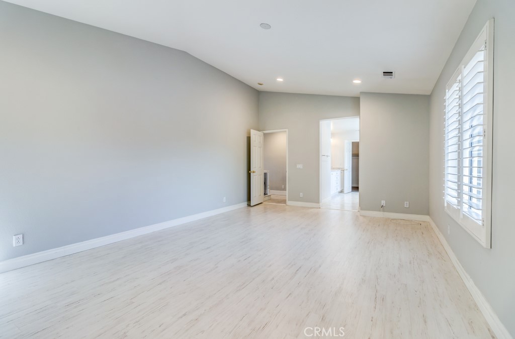 8 Zinnia Irvine, CA 92618 - Photo 37 of 39 a view of a livingroom with wooden floor