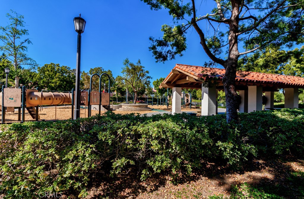 8 Zinnia Irvine, CA 92618 - Photo 10 of 39 a front view of a house with a tree