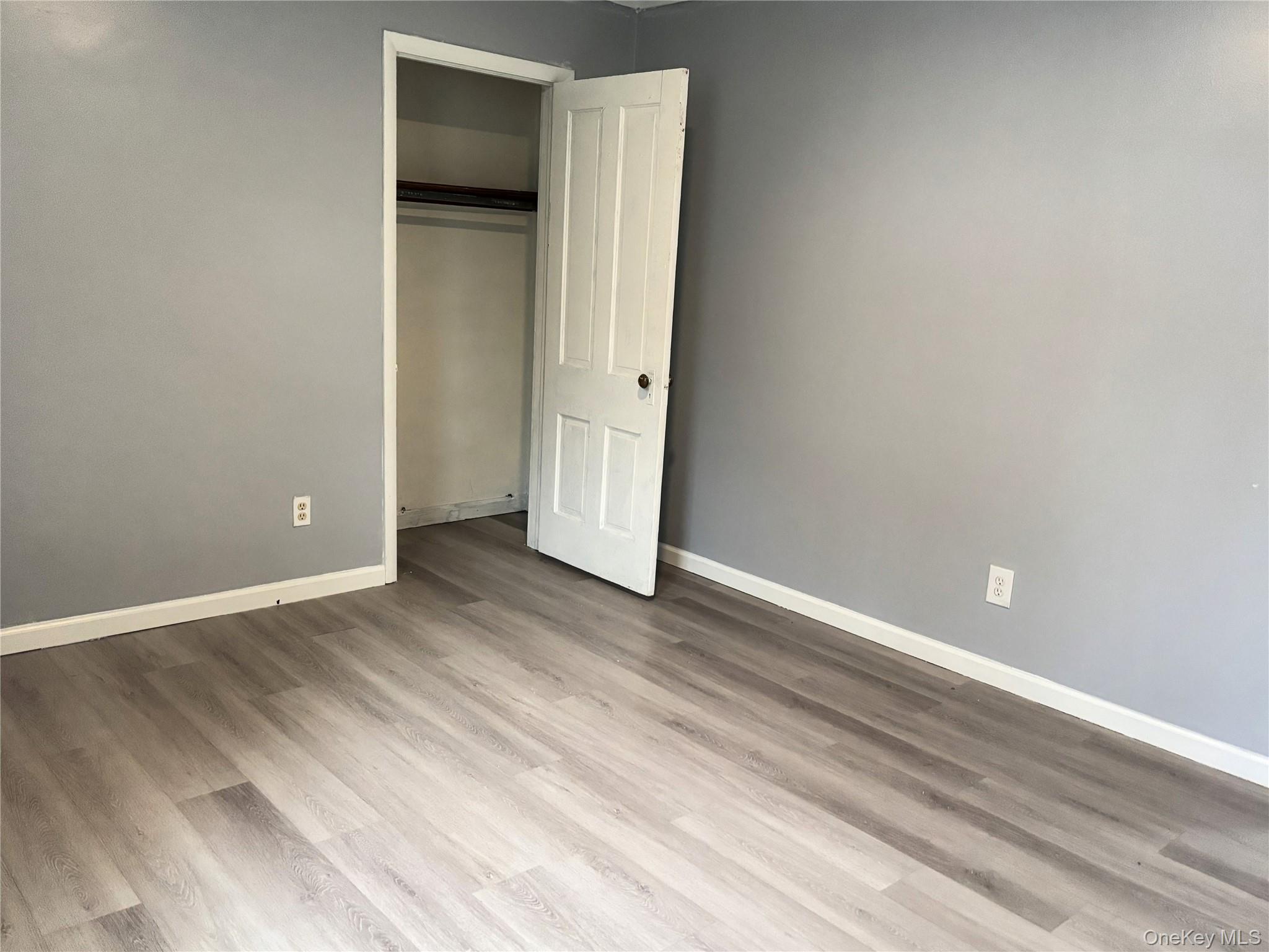 210 Mt Prosper Road Wurtsboro, NY 12790 - Photo 11 of 14 a view of an empty room with closet and a window
