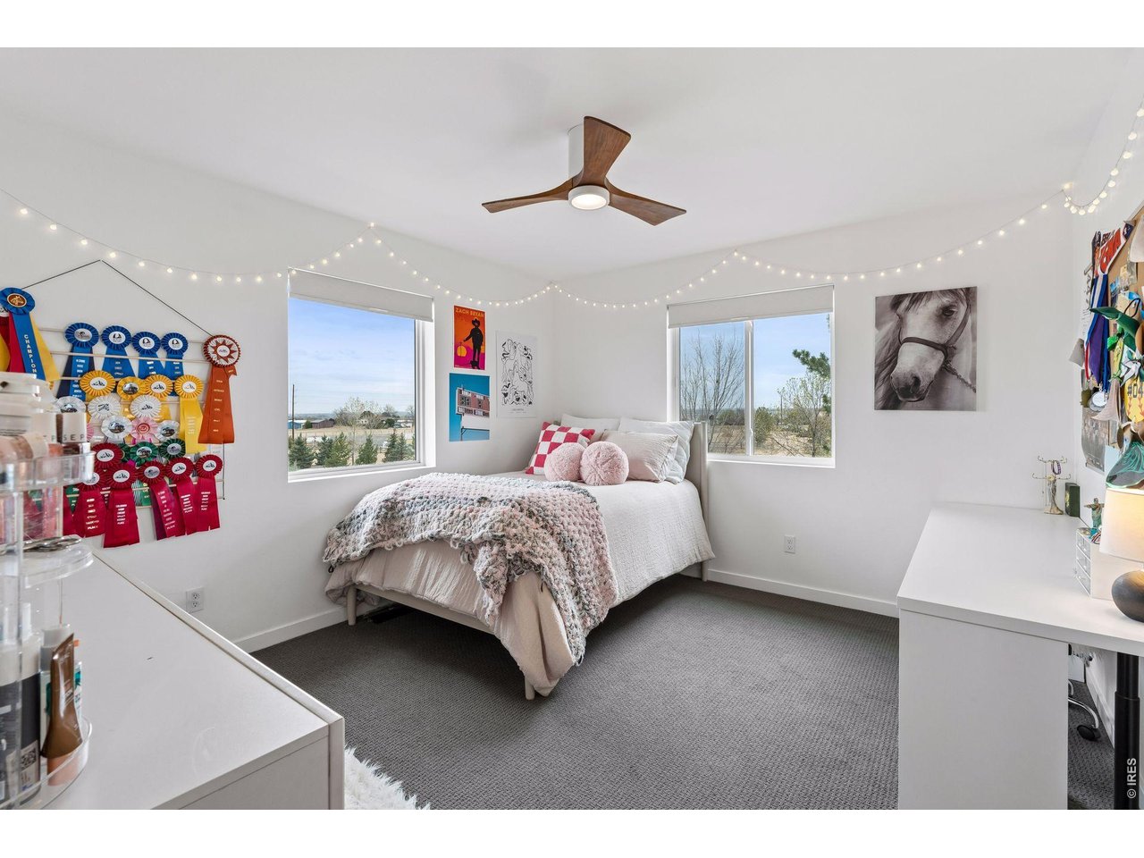 9421 Gunbarrel Ridge Road Boulder, CO 80301 - Photo 28 of 50 a bedroom with a bed and a desk