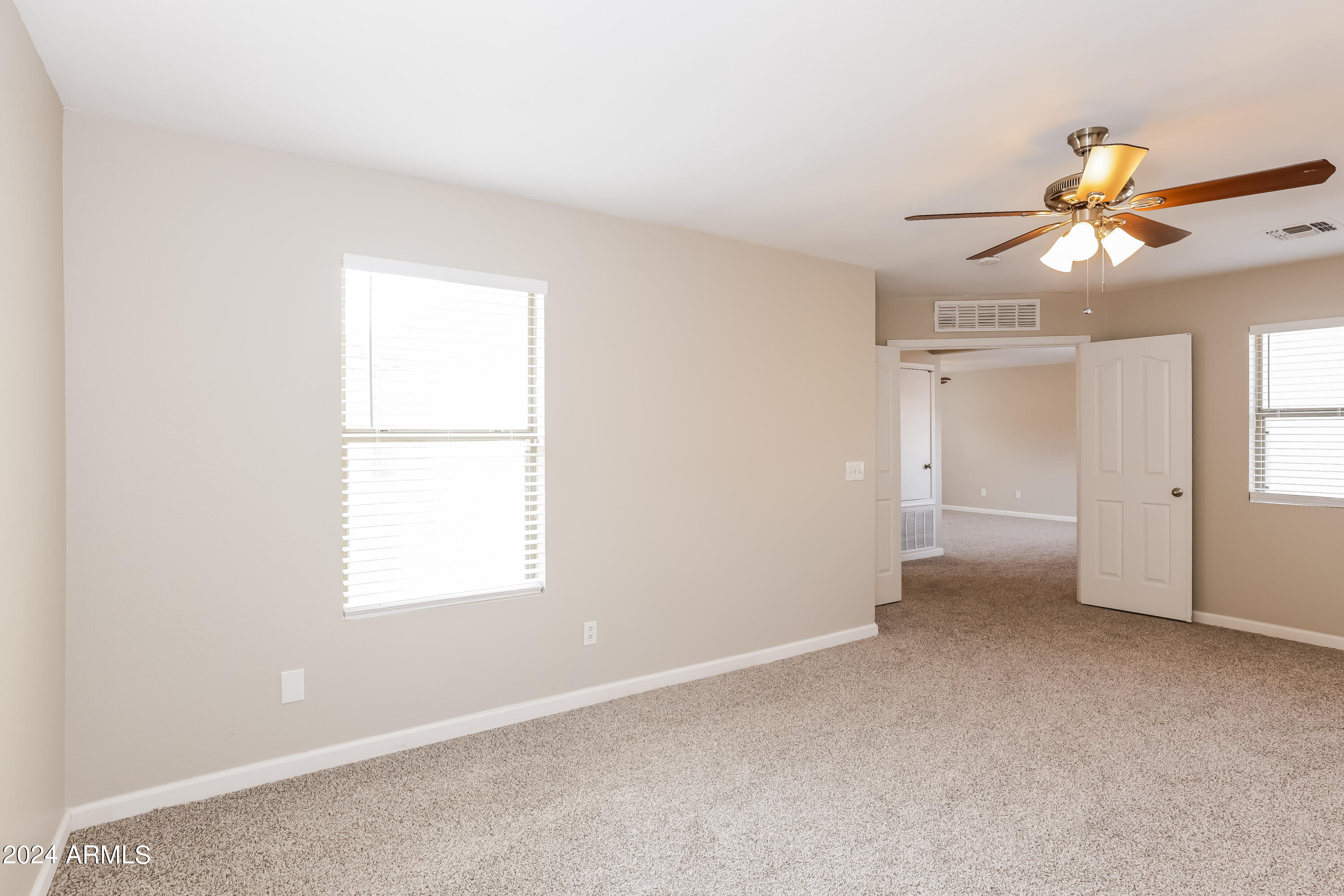 11171 West Garfield Street Avondale, AZ 85323 - Photo 12 of 15 008-photo-main-bedroom-11762299