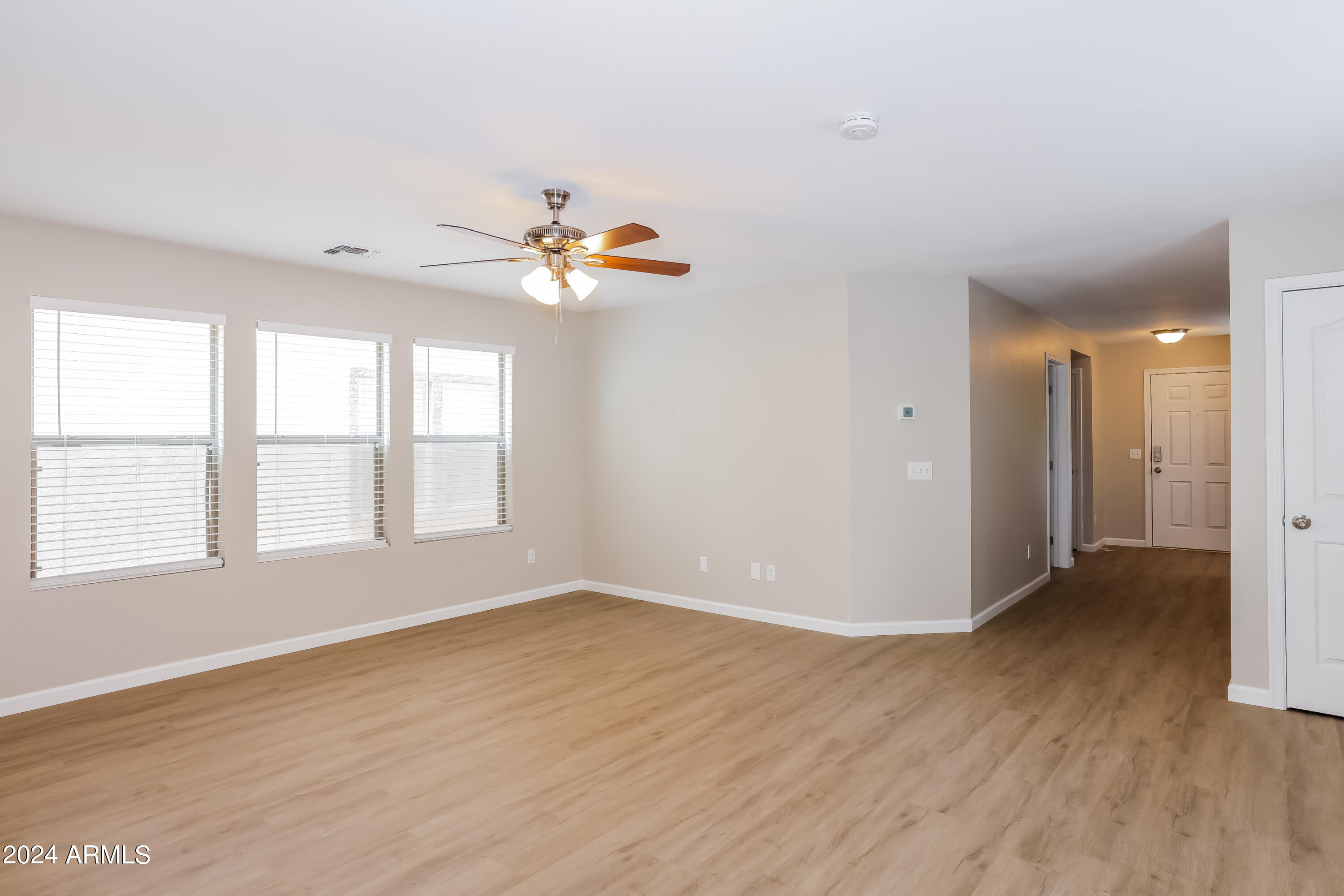 11171 West Garfield Street Avondale, AZ 85323 - Photo 4 of 15 002-photo-living-room-11762310