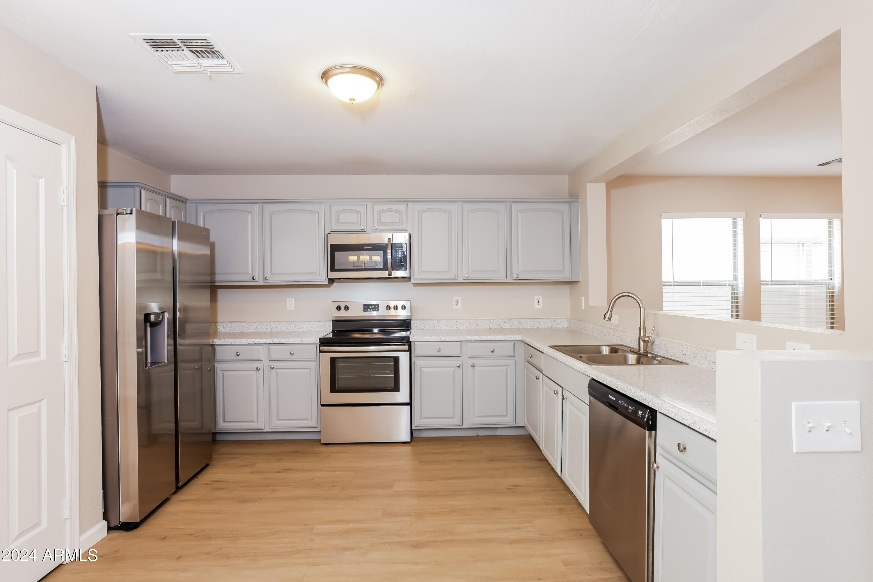 11171 West Garfield Street Avondale, AZ 85323 - Photo 6 of 15 004-photo-kitchen-11762307