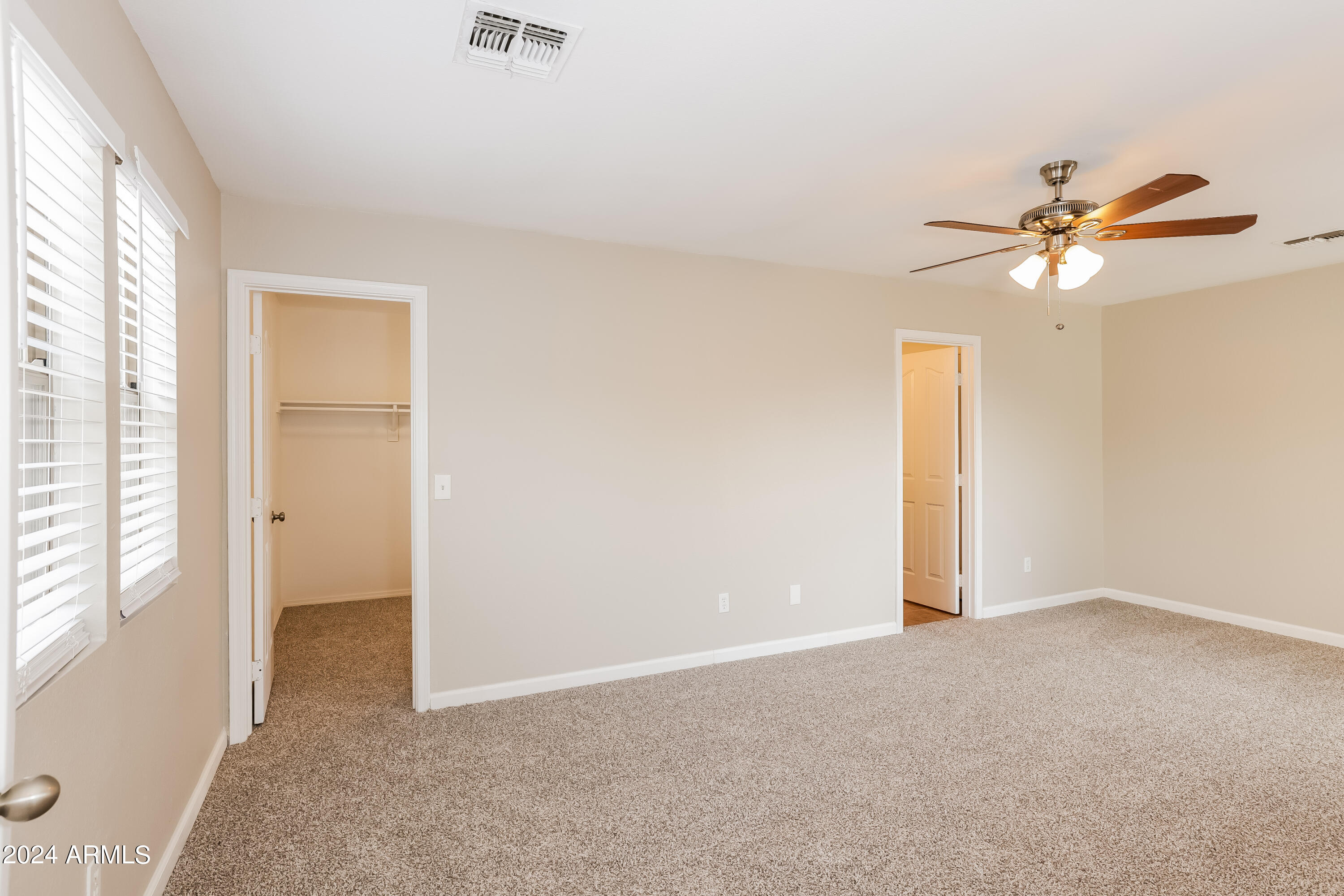 11171 West Garfield Street Avondale, AZ 85323 - Photo 8 of 15 006-photo-main-bedroom-11762298