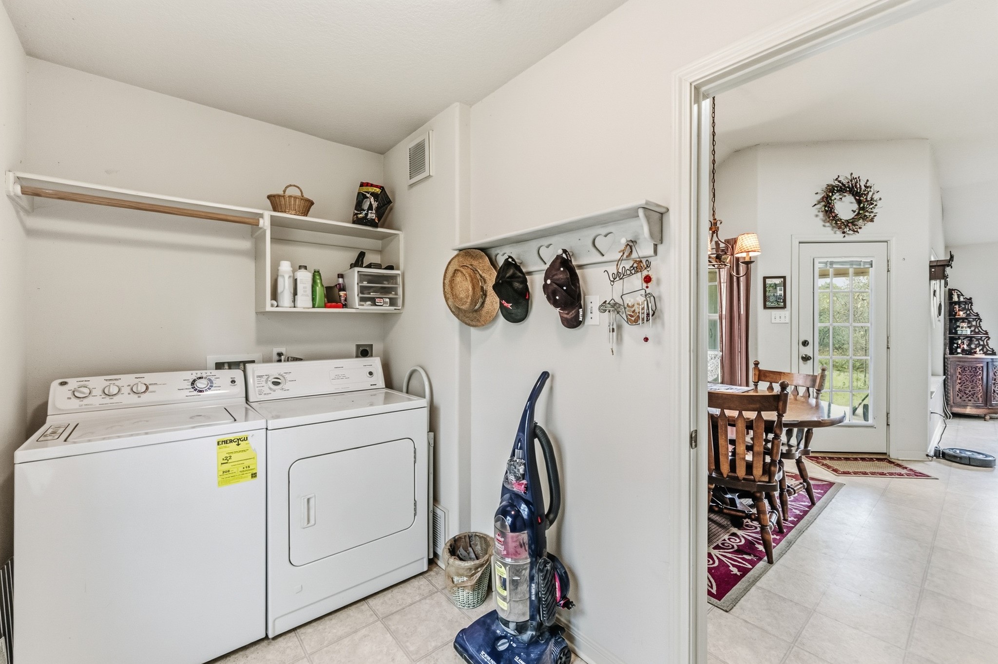 691 Bishop Road Huntsville, TX 77320 - Photo 23 of 32 a utility room with dryer and washer