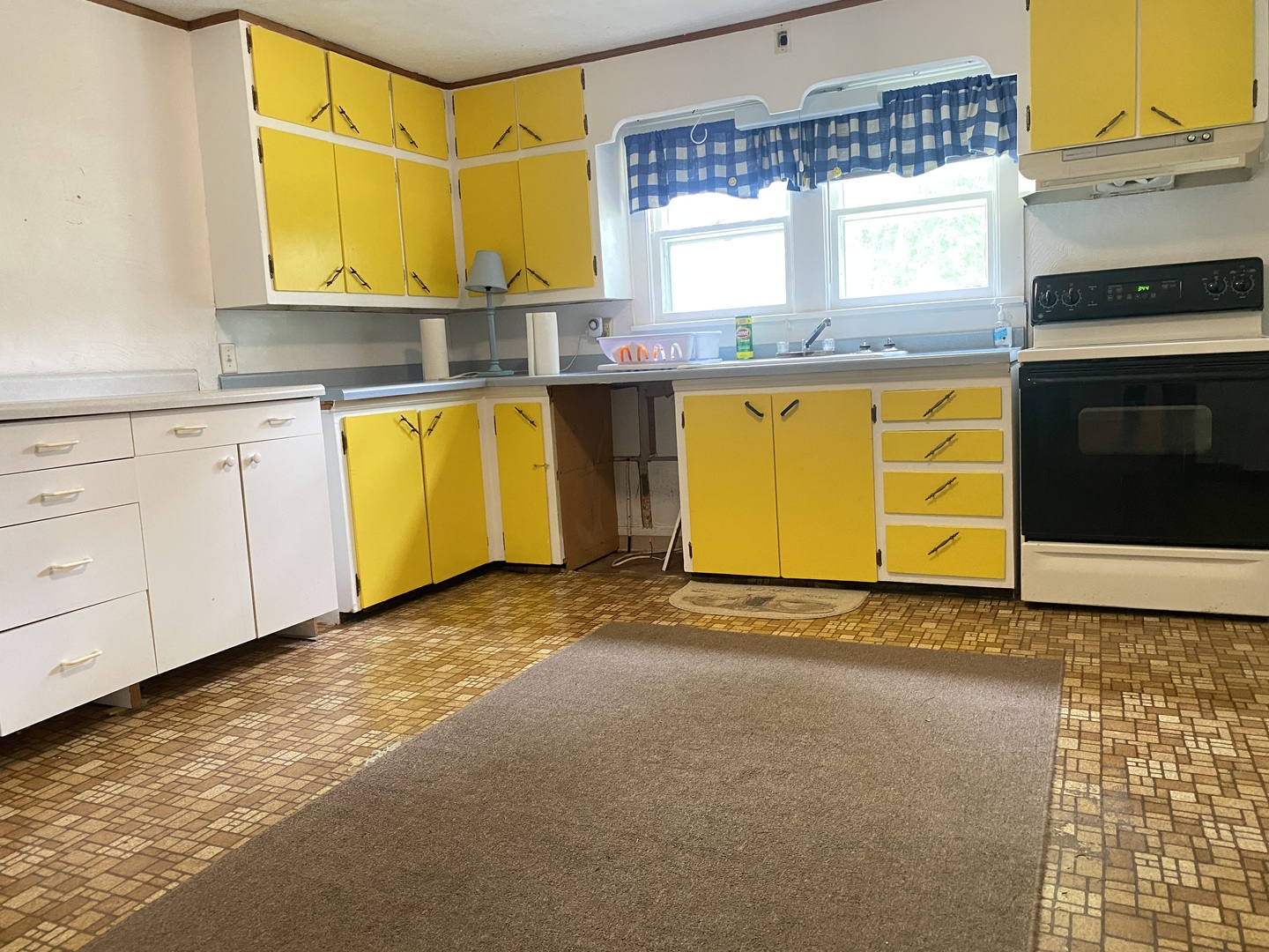 25000 Como Road Sterling, IL 61081 - Photo 8 of 25 a view of a kitchen with wooden floor and a sink