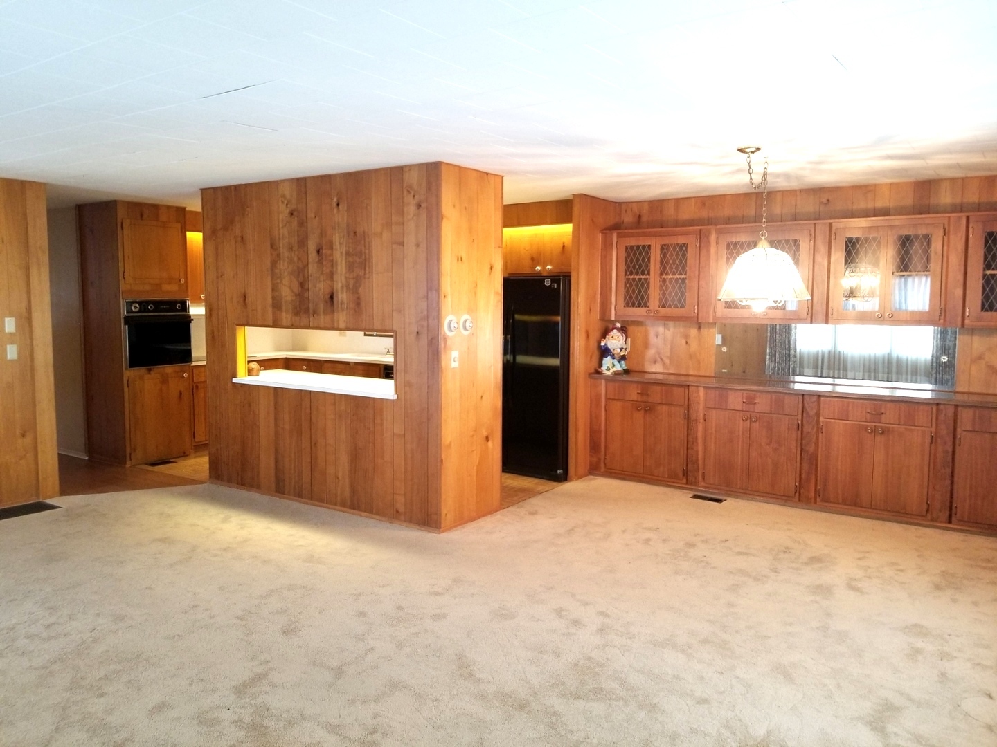 248 Bayview Road Elgin, IL 60123 - Photo 4 of 13 a view of a kitchen with kitchen island granite countertop refrigerator and sink