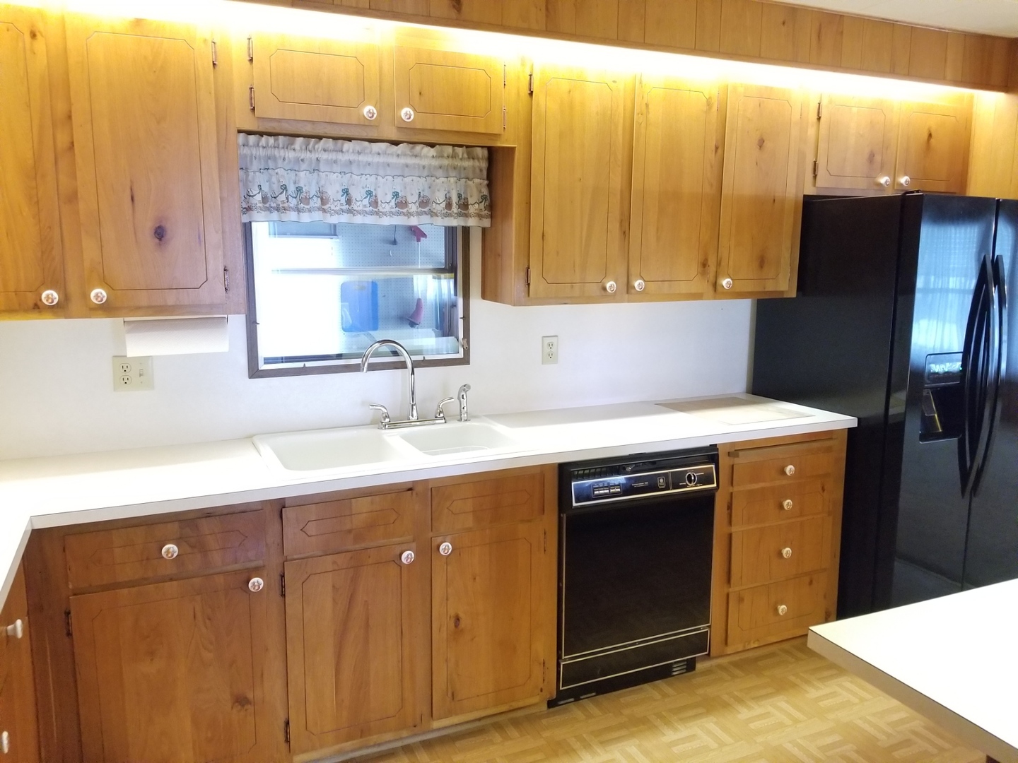 248 Bayview Road Elgin, IL 60123 - Photo 7 of 13 a kitchen with stainless steel appliances granite countertop a sink stove and refrigerator