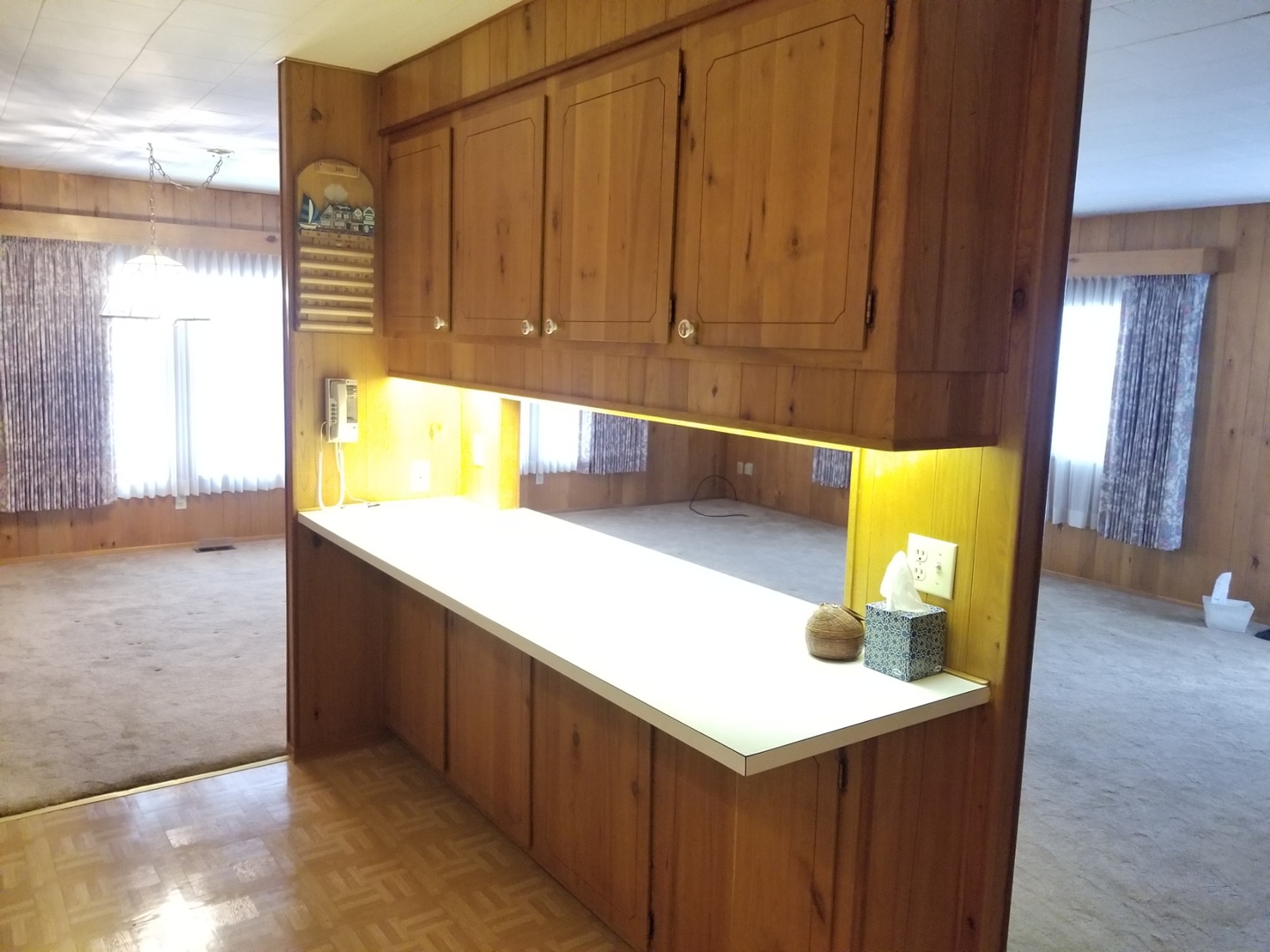 248 Bayview Road Elgin, IL 60123 - Photo 8 of 13 a kitchen with a sink and a mirror