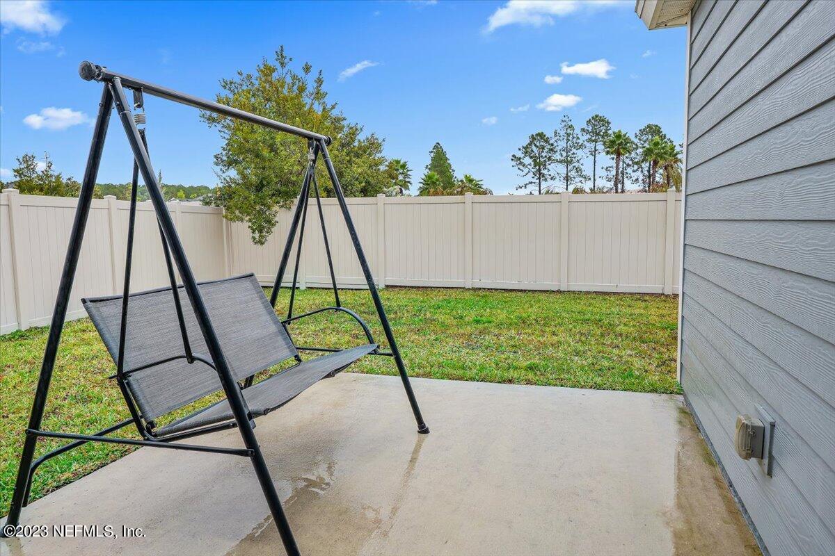 8300 Guild Way Jacksonville, FL 32222 - Photo 17 of 18 a view of backyard with a slide