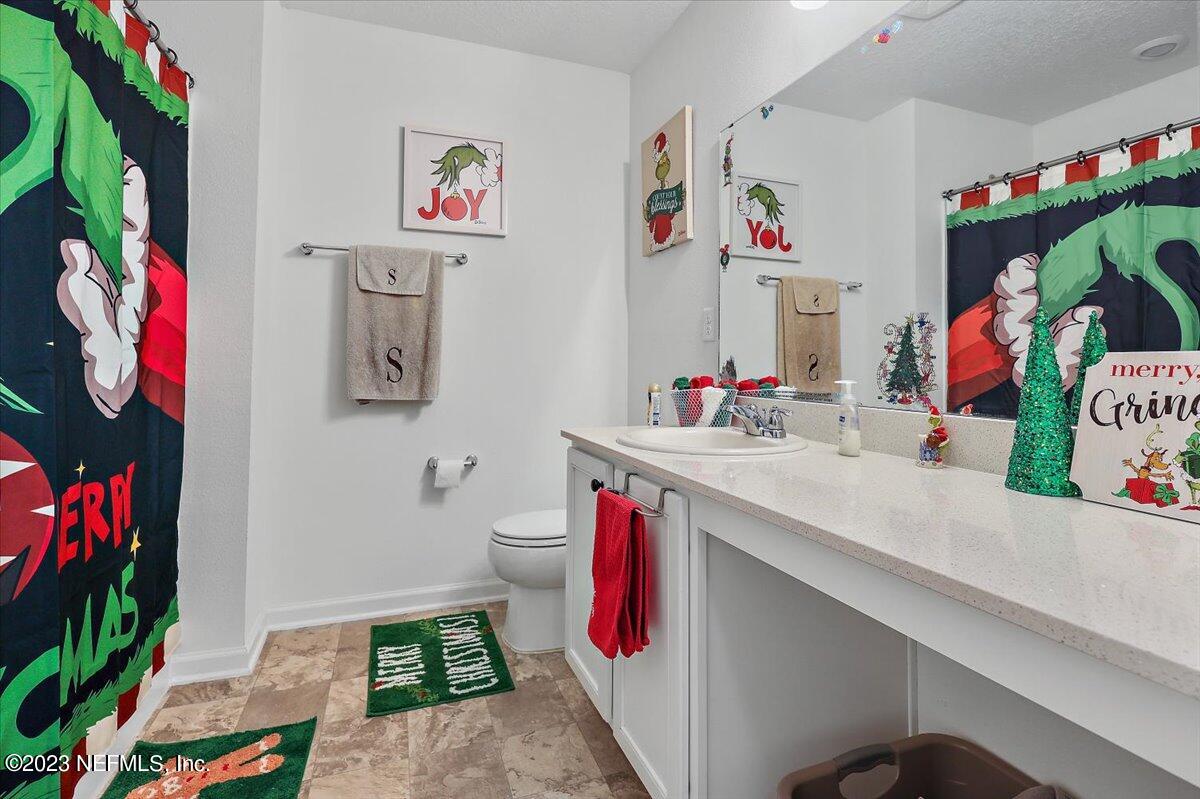 8300 Guild Way Jacksonville, FL 32222 - Photo 9 of 18 a very nice looking room with a white couch