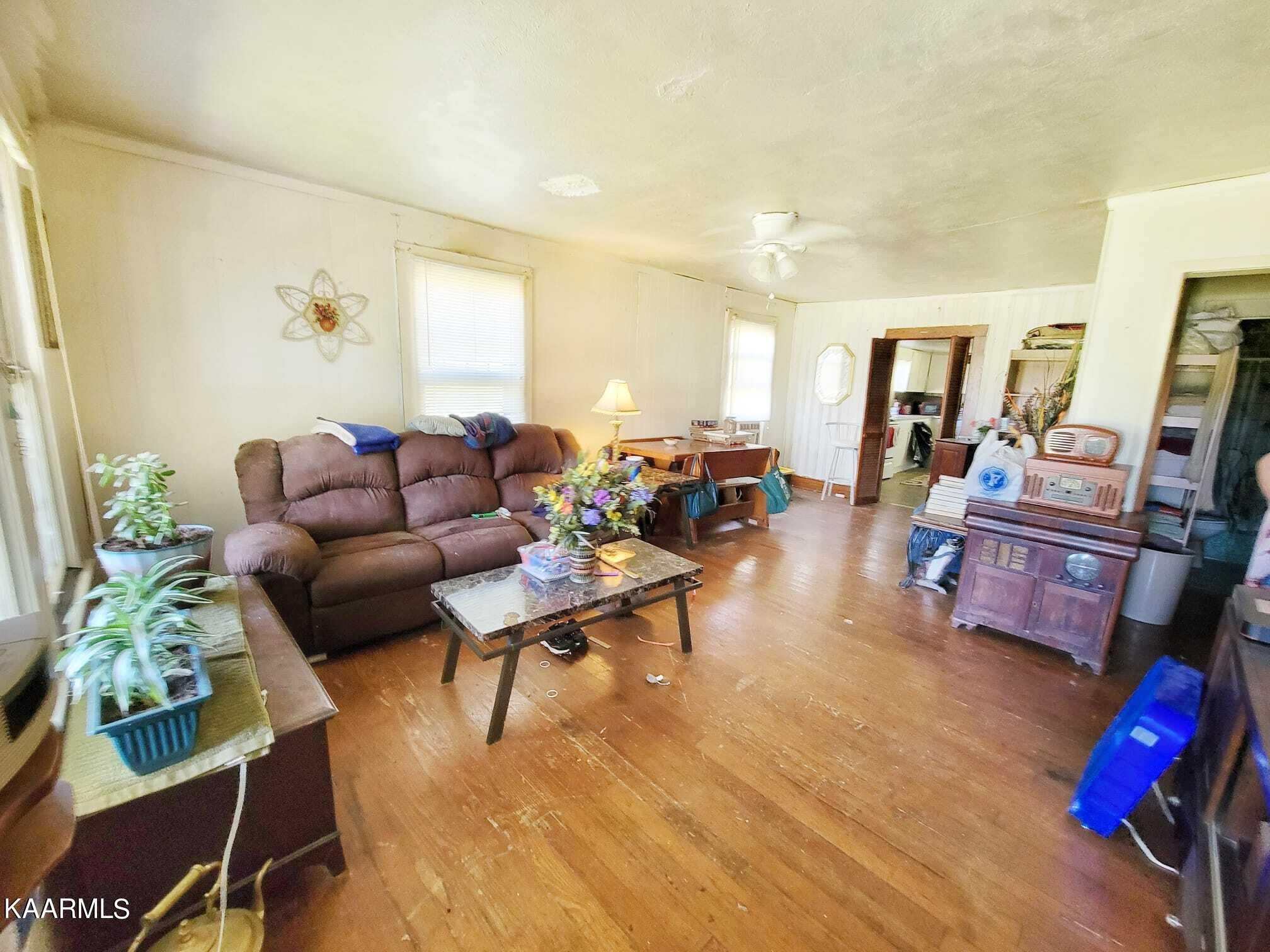 104 Highway 160 Newport, TN 37821 - Photo 16 of 24 a living room with furniture a rug and a flat screen tv