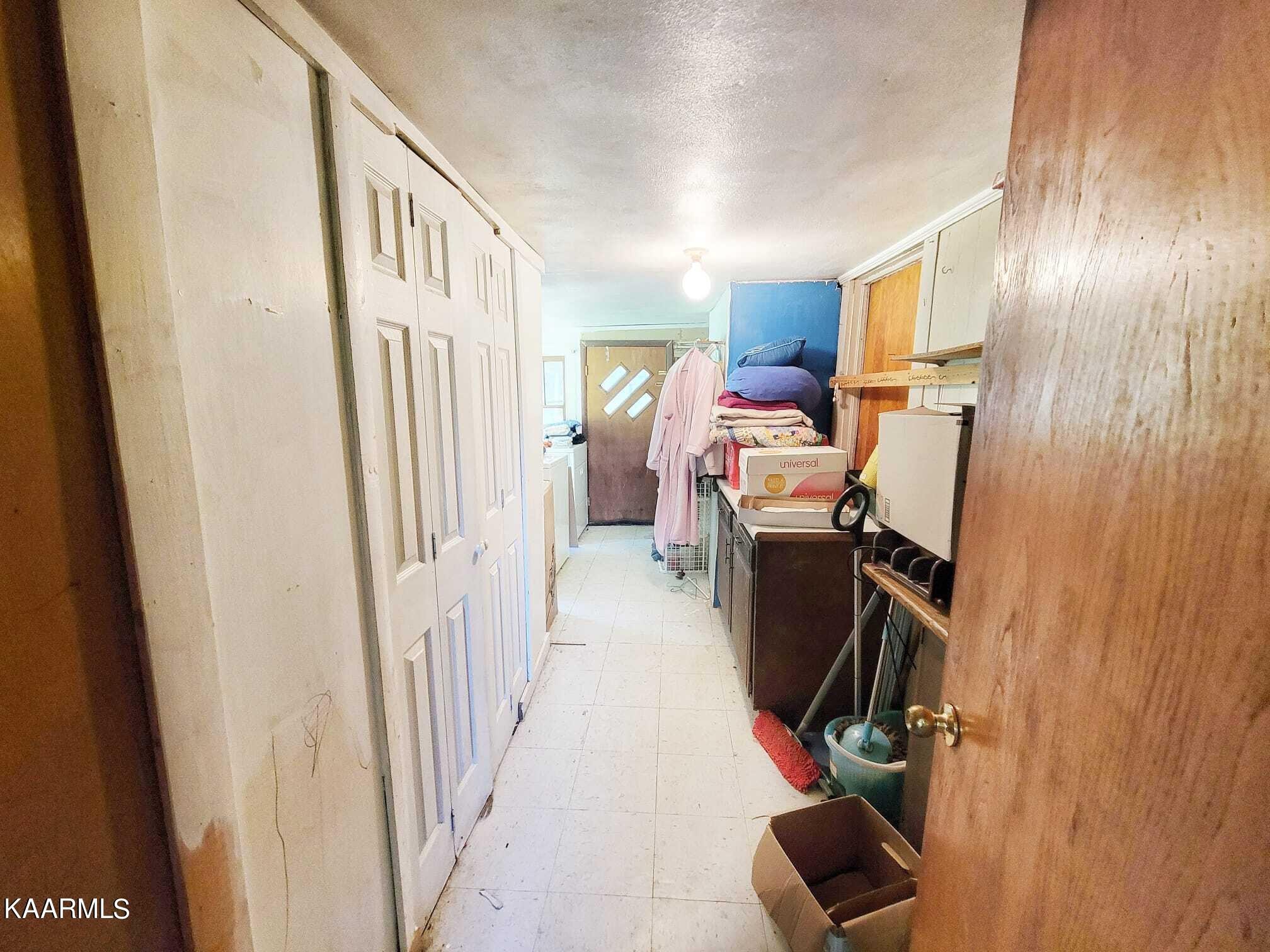 104 Highway 160 Newport, TN 37821 - Photo 23 of 24 a view of a hallway with workspace and a window