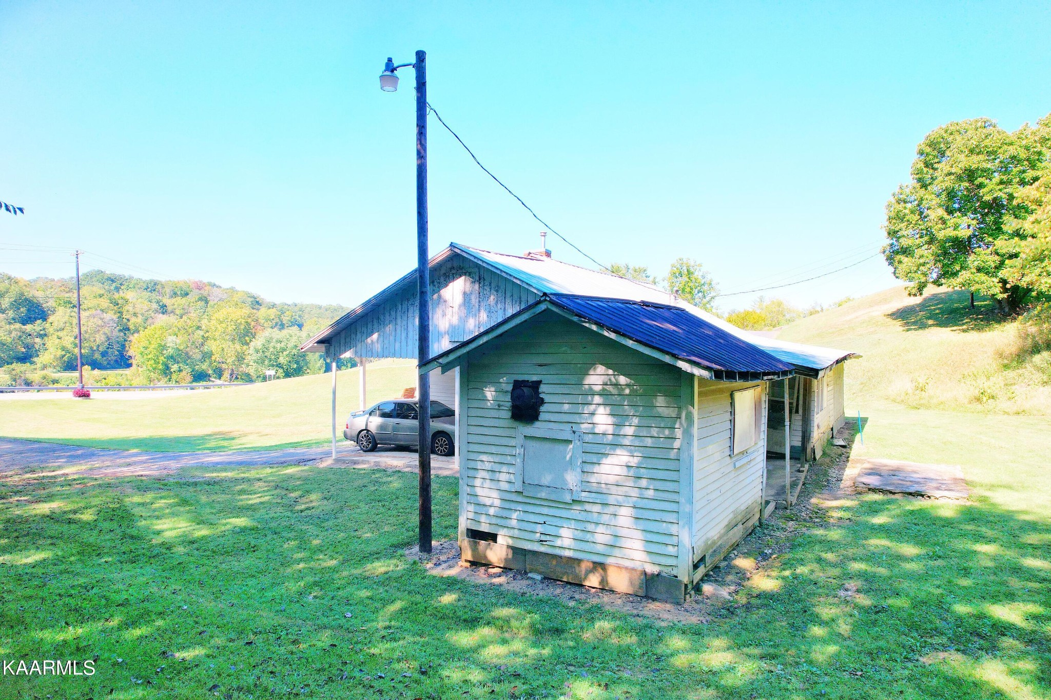 104 Highway 160 Newport, TN 37821 - Photo 6 of 24 a front view of house with yard and outdoor seating