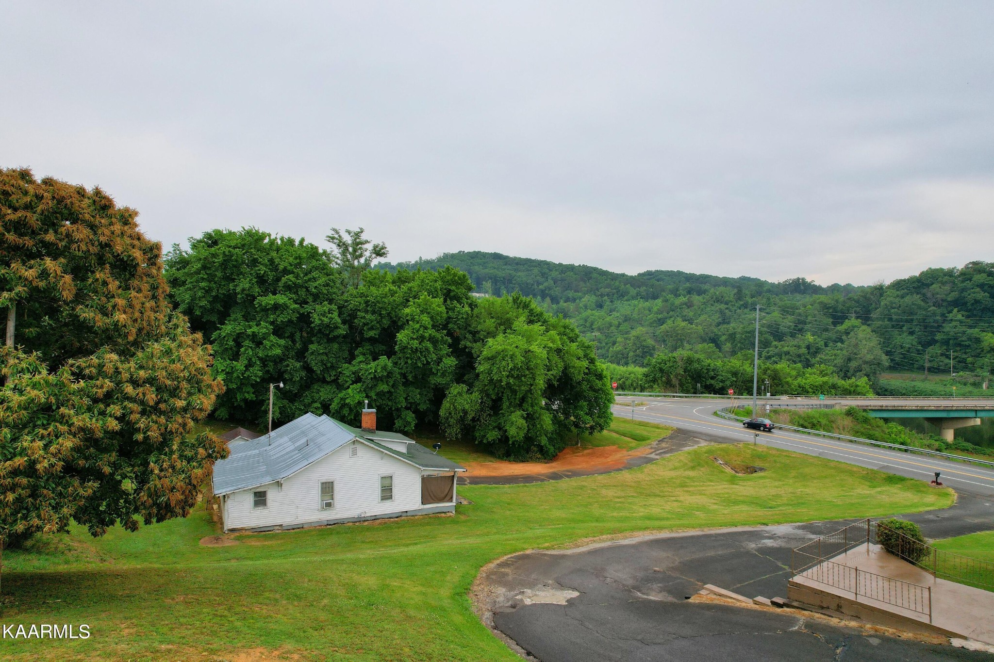 104 Highway 160 Newport, TN 37821 - Photo 7 of 24 a view of a house with a yard