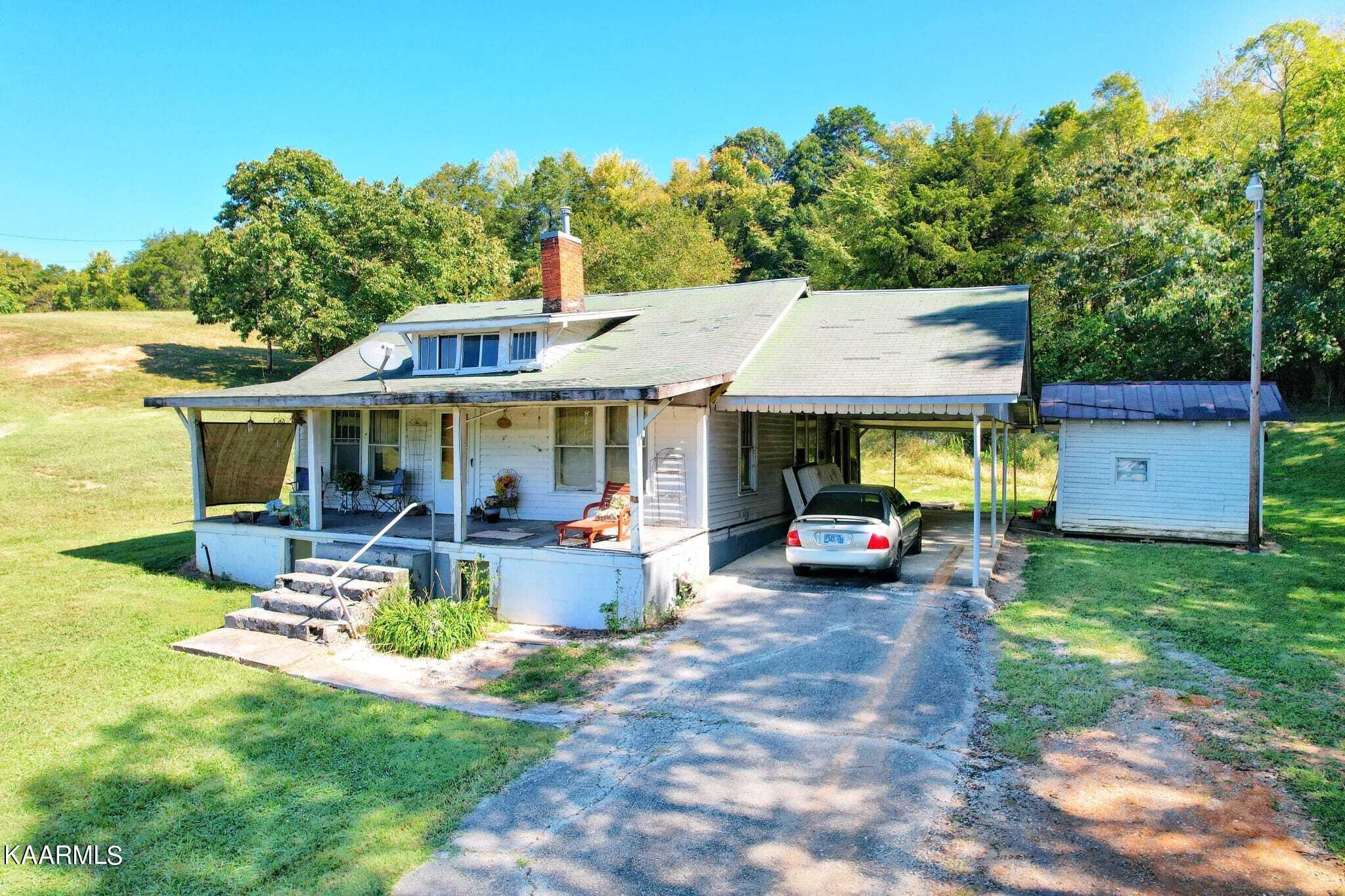 104 Highway 160 Newport, TN 37821 - Photo 9 of 24 a view of a house with backyard porch and sitting area